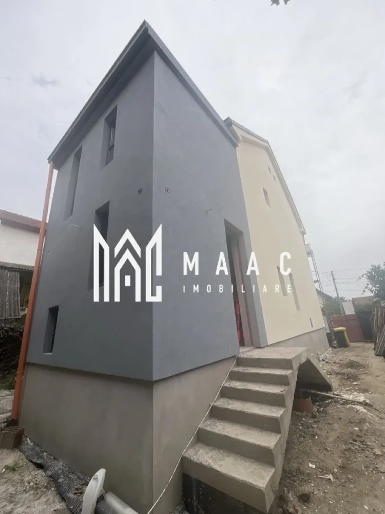Casa moderna - 297 MPU I Vasile Aaron I Garaj I 318 MP Teren - MAAC Imobiliare vă propune spre vânzare o proprietate complet renovată în 2025, caracterizată printr-un design modern, compartimentare inteligentă și multiple posibilități de utilizare – locuință, birou, spațiu comercial sau investiție în regim hotelier. Caracteristici generale: Proprietatea este alcătuită dintr-o casă D+P+E+M, teren cu acces pe două străzi și garaj individual. Construcția a fost extinsă și reconfigurată pentru a răspunde cerințelor actuale de confort, funcționalitate și eficiență energetică. Detalii construcție – 297 mp utili Demisol (81 mp): 2 camere, baie, spațiu tehnic, zonă de depozitare/pivniță sub casa scării. Parter (81 mp): living generos cu bucătărie, cameră suplimentară, baie, spațiu tehnic și hol. Etaj (81 mp): dormitor matrimonial cu dressing walk-in, baie cu două intrări, spațiu tehnic și 2 camere cu design pe două niveluri – cu zonă de living multifuncțională la nivelul inferior și spațiu privat (birou/dressing/odihnă) la nivelul superior, cu baie proprie. Mansardă (49 mp): două zone pentru dormitor/birou, două băi și două dressinguri walk-in, conectate la camerele multifuncționale de la etaj. Acest concept arhitectural oferă eleganță, volum și flexibilitate, fiind ideal pentru o amenajare premium și un stil de viață contemporan. Teren – 318 mp Alei pietonale și acces auto (capacitate 2–3 mașini în interiorul proprietății, plus 2 locuri suplimentare în exterior) Grădină amenajabilă și spațiu pentru terasă Acces dublu: auto și pietonal în față, acces pietonal suplimentar în spate Garaj de 20 mp – cu șaht auto, structură din cărămidă și placă de beton Dotări și specificații tehnice: Două accese separate, fiecare deservind zone diferite ale casei, ambele prevăzute cu sisteme de control acces și video-interfon. Sistem de supraveghere video (8 puncte de monitorizare). Demisol cu branșamente separate la electricitate (monofazat) și gaz – cu posibilitate de funcționare independentă. Parter, etaj și mansardă alimentate prin branșament electric trifazat și gaz separat. Instalații refăcute complet: apă, canalizare nouă, fibră optică. Izolație exterioară cu vată bazaltică de 10 cm – performanță termică și fonică superioară. Soclu izolat cu polistiren extrudat de 5 cm – protecție împotriva umezelii. Tâmplărie PVC premium cu geam termopan. Pereți solizi: cărămidă plină la parter (40 cm), zidărie Porotherm la etaj și mansardă (25 cm). Trasee electrice și termice pregătite pentru sistem de climatizare. 🧭 Avantaje majore: ✅ Proprietate complet renovată și modernizată în 2025 ✅ Compartimentare inteligentă, cu posibilitatea utilizării fiecărui nivel independent ✅ Ideală pentru rezidență, birouri, clinici sau regim hotelier ✅ Acces dublu și garaj propriu ✅ Finisaje și materiale de înaltă calitate ✅ Oportunitate excelentă de investiție Pentru mai multe detalii și vizionări, precizati telefonic ca ati vazut anuntul cu ID:CP2771546 }}