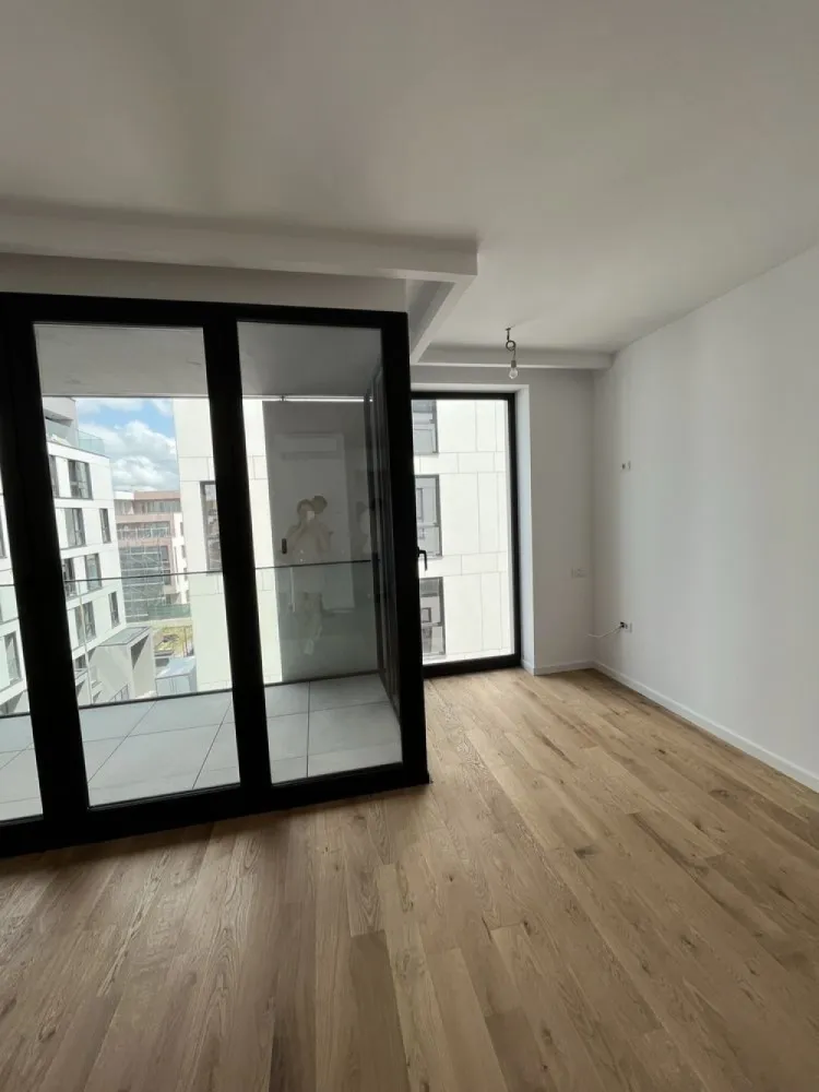 Inchirie apartament 2 camere spatios WIN Herastrau - Inchiriez apartament cu 2 camere nou finisat, in complex nou elegant, cu loc de parcare. Apartamentul are balcon si un spatiu care se poate inchide pentru dormitor Zona linistita, conplex ultramodern Se poate mobila la cefere in functie de preferinte