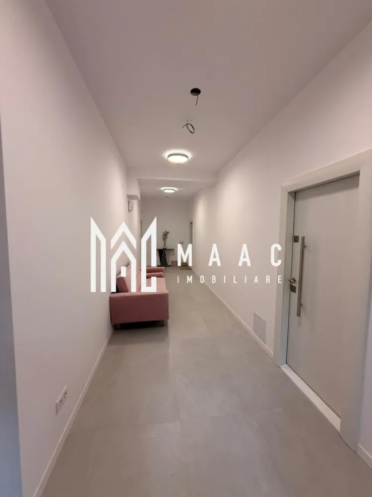 Spațiu comercial versatil I Selimbar-Zona Unimat - MAAC Imobiliare vă propune spre închiriere un spațiu comercial modern și luminos, conceput pentru a oferi confort, funcționalitate și o imagine profesională afacerii dumneavoastră. Proprietatea este structurată în două încăperi generoase, fiecare beneficiind de baie proprie și de toate utilitățile necesare (curent electric, apă și canalizare), oferind astfel independență și flexibilitate în utilizare: Camera 5 : 64 mp Camera 6: 65 mp Accesul se realizează printr-o intrare comună, care se deschide într-un hol , ce face legătura între cele două spații. Această dispunere permite atât utilizarea unitară a proprietății, cât și compartimentarea în funcție de nevoile viitorului ocupant. Beneficii principale: Două spații independente, fiecare cu grup sanitar propriu Acces comun, printr-un hol dedicat Toate utilitățile disponibile Posibilitate de personalizare și adaptare funcțională Lumină naturală Pretul se raporteaza la mpu. Un spațiu care îmbină eleganța, confortul și versatilitatea, oferind cadrul perfect pentru dezvoltarea unei afaceri de succes. Pentru detalii suplimentare și programarea unei vizionări, vă invităm să contactați echipa MAAC Imobiliare si precizati telefonic ca ati vazut anuntul cu ID: CP2761419 }}