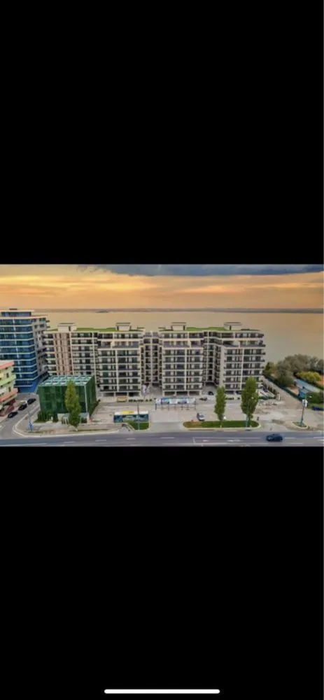 Apartament Solid House Residence Mamaia - Complex Solid House Residence O Baie O Bucătărie Dormitor cu bat dublu Living cu canapea extensibila Balcon cu vedere la lac Loc de parcare cu telecomanda pentru bariera 57 mp2 etaj 3