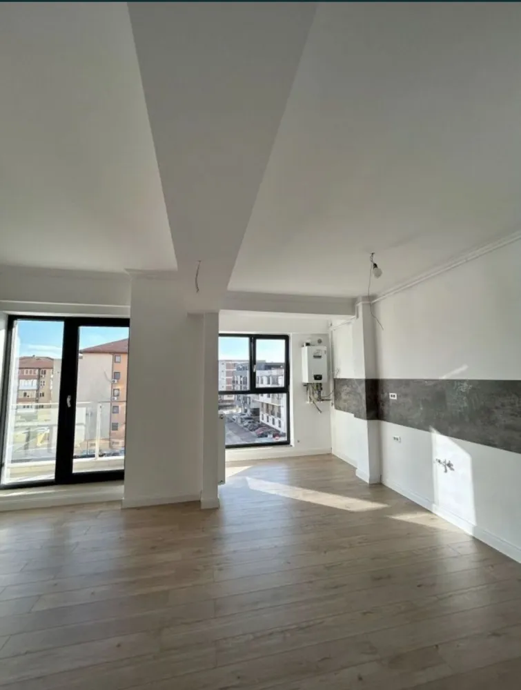 Apartament de vanzare - De vânzare apartament 2 camere, în Complexul Energia Residence Constanța. Este situat la etajul 3 și are o suprafață totală de 70mp + 2 balcoane. Se vinde cu împreună cu locul de parcare suprateran care este inclus în preț.