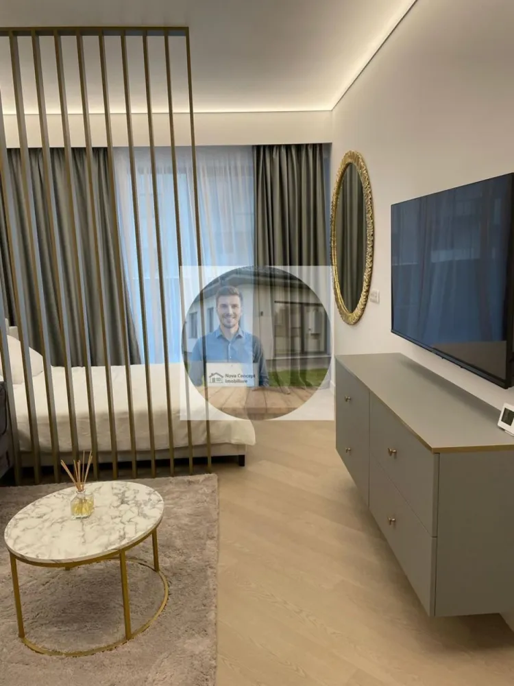 Studio COrtina North Bulevardul Pipera - Ofer spre închiriere studio în complexul Cortina North Apartamentul este pregătit pentru mutare imediată. Dispune de: veselă, pahare, tacâmuri, aspirator, mop, fier și masă de călcat, uscător de rufe etc. Prețul variază în funcție de modalitatea de plată aleasă: • 600 Euro/lună (pentru plata integrală pe 1 an) • 630 Euro/lună (pentru plata la fiecare 6 luni) • 650 Euro/lună (pentru plata la fiecare 2 luni) Condiții: • Contract minim 1 an. • Garanție: contravaloarea unei luni de chirie. • Nu se acceptă animale de companie.