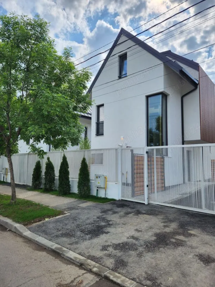 Case de vanzare Bucurestii Noi Straulesti - Va prezentam spre vanzare un nou proiect imobiliar realizat de EMsia Construction Koncept, WHITE RESIDENCE, un complex deosebit, privat, format din 9 case single si cuplate. Toate finisajele interioare sunt de calitate superioara (gresie, faianta, parchet, obiecte sanitare, usi, etc.), sunt incluse in pretul caselor, acestea se predau la cheie si dispun de toate utilitatile necesare (apa-canal, gaze, curent, acces fibra optica Digi). Casele sunt economice energetic fiind prevăzute cu încalzire in pardoseala, sistem termic si fonic foarte eficient ce asigura o temperatura constanta tot timpul anului cu un consum minim de energie. Bransament electric 25 kw, posibilitate montare panouri fotovoltaice infrastructura deja existenta, priza incarcare auto putere 25 kw. Accesul in complex este automatizat si supravegheat video. Curtea este amenajata, iar fiiecare casa dispune de 2 locuri de parcare. WHITE RESIDENCE este situat intr-o zona linistita dar care raspunde tuturor nevoilor practice, precum accesul facil catre statiile de transport STB, Metrou, DN1 si DN7, Gara, Aeroportul Otopeni , magazine in apropriere. Detalii proiect: Localizare: Bulevardul Petrila, Nr. 7A-7E, Bucuresti, Sector 1. Regim inaltime: P+1E+Pod Suprafata utila: 105 mp Gradina amenajata+ doua locuri de parcare Parter: avem un hol elegant, grup sanitar, bucatarie moderna open-space, living luminos cu iesire direct in gradina amenajata. Etaj: acces prin scara de lemn, hol, 2 dormitoare spatioase, baie prevazuta cu cada pentru un plus de rasfat dupa o zi agitata. Podul: acces prin scara de lemn, hol, 2 dormitoare spatioase, baie prevazuta cu cabina de dus. Investeste in casa ta, intr-un stil de viata : prima casa la pret special de lansare proiect de doar 235.000 de euro (fa ra TVA). Planifica o vizionare!