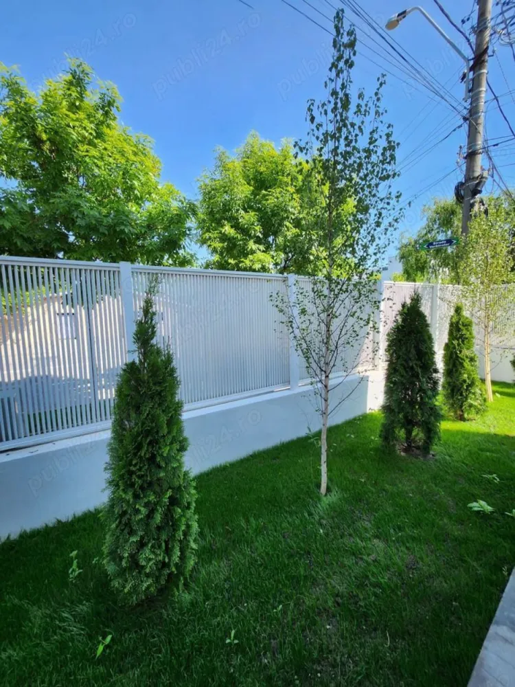 Case de vanzare Bucurestii Noi Straulesti - Va prezentam spre vanzare un nou proiect imobiliar realizat de EMsia Construction Koncept, WHITE RESIDENCE, un complex deosebit, privat, format din 9 case single si cuplate. Toate finisajele interioare sunt de calitate superioara (gresie, faianta, parchet, obiecte sanitare, usi, etc.), sunt incluse in pretul caselor, acestea se predau la cheie si dispun de toate utilitatile necesare (apa-canal, gaze, curent, acces fibra optica Digi). Casele sunt economice energetic fiind prevăzute cu încalzire in pardoseala, sistem termic si fonic foarte eficient ce asigura o temperatura constanta tot timpul anului cu un consum minim de energie. Bransament electric 25 kw, posibilitate montare panouri fotovoltaice infrastructura deja existenta, priza incarcare auto putere 25 kw. Accesul in complex este automatizat si supravegheat video. Curtea este amenajata, iar fiiecare casa dispune de 2 locuri de parcare. WHITE RESIDENCE este situat intr-o zona linistita dar care raspunde tuturor nevoilor practice, precum accesul facil catre statiile de transport STB, Metrou, DN1 si DN7, Gara, Aeroportul Otopeni , magazine in apropriere. Detalii proiect: Localizare: Bulevardul Petrila, Nr. 7A-7E, Bucuresti, Sector 1. Regim inaltime: P+1E+Pod Suprafata utila: 105 mp Gradina amenajata+ doua locuri de parcare Parter: avem un hol elegant, grup sanitar, bucatarie moderna open-space, living luminos cu iesire direct in gradina amenajata. Etaj: acces prin scara de lemn, hol, 2 dormitoare spatioase, baie prevazuta cu cada pentru un plus de rasfat dupa o zi agitata. Podul: acces prin scara de lemn, hol, 2 dormitoare spatioase, baie prevazuta cu cabina de dus. Investeste in casa ta, intr-un stil de viata : prima casa la pret special de lansare proiect de doar 235.000 de euro (fa ra TVA). Planifica o vizionare!