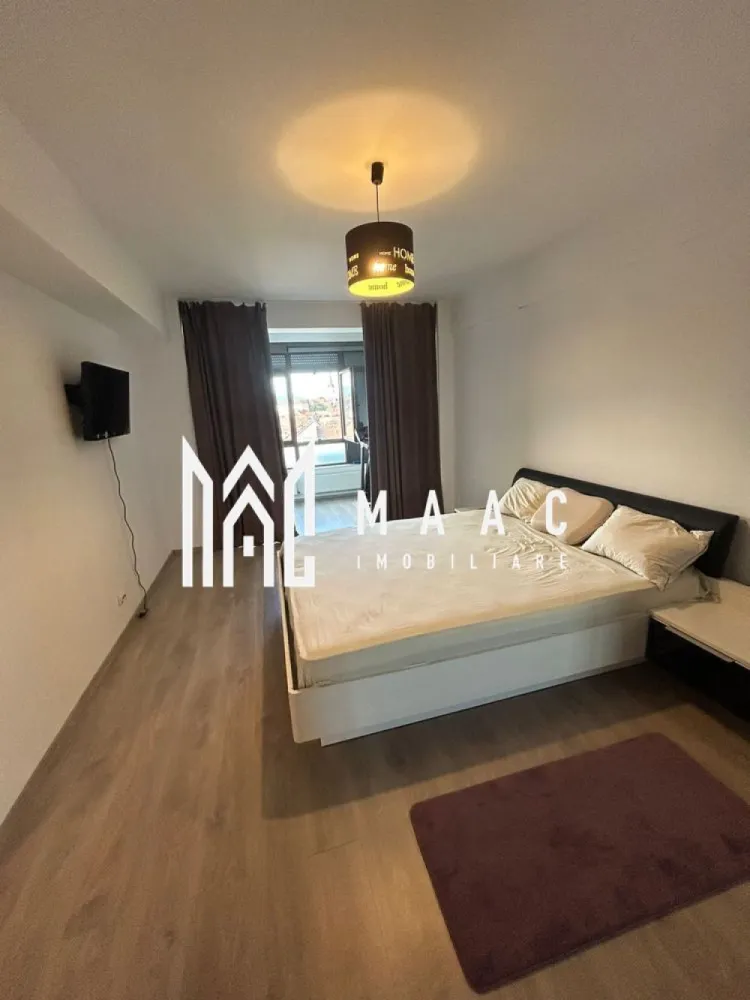 Apartament Ultracentral | 2 camere | 95 mp utili - MAAC Imobiliare vă propune spre inchiriere un apartament modern cu o locație excelentă, situat la doar câteva minute de Centrul orașului Sibiu și de noul Mall, în apropiere de Autogară și Gară. Detalii apartament: Suprafață utilă: 95 mp Compartimentare: Living generos + Dormitor spațios 2 băi moderne Mobilat și utilat complet 2 unități aer condiționat Electrocasnice premium: mașină de spălat AEG, uscător de rufe, mașină de spălat vase Clădire dotată cu lift modern Avantaje și facilități: Living amplu, perfect pentru relaxare și timp petrecut cu familia Dormitor luminos, cu suficient spațiu pentru un pat matrimonial și mobilier Priveliște spectaculoasă spre Centrul orașului și Dealul Gușteriței Locație centrală, cu acces rapid la școli, magazine, mijloace de transport și zone de interes Doar 5 minute de mers pe jos până în Piața Mare 📞Contactează-ne pentru mai multe detalii sau pentru a programa o vizionare, menționați CP2681746! }}