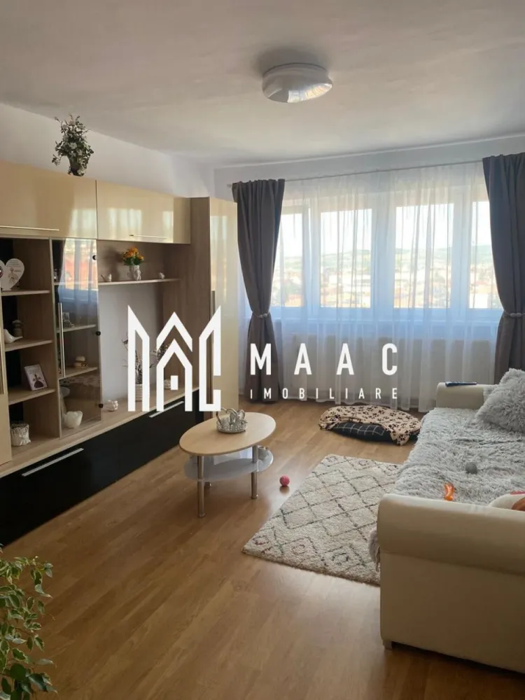 Apartament 2 camere | 55 MPU | Pivnita | Balcon | Bulevardul Mihai Viteazul - MAAC Imobiliare vă propune spre vânzare un apartament modern cu 2 camere, situat pe Bulevardul Mihai Viteazul, la etajul 10/10, cu vedere superbă spre Munții Făgăraș. Detalii apartament: Suprafață utilă: 55 mp Balcon închis: 12 mp – spațiu generos pentru relaxare sau depozitare Compartimentare: decomandată, practică și luminoasă Etaj: 10/10 (bloc dotat cu lift) Dotări și finisaje: Apartament complet renovat și mobilat modern Centrală termică proprie Geamuri termopan pentru izolare fonică și termică Finisaje de calitate, pregătit pentru mutare imediată Avantaje: Vedere panoramică spre munți Lumină naturală din plin, datorită poziționării excelente Zonă centrală, cu toate facilitățile la doar câțiva pași: magazine, farmacii, transport public, școli Acces rapid către centrul orașului – doar 1,4 km de Piața Mare (3–4 minute cu mașina sau 15–20 minute de mers pe jos) Pentru mai multe detalii sau pentru a programa o vizionare, contactați-ne specificand ID: CP2681539 }}