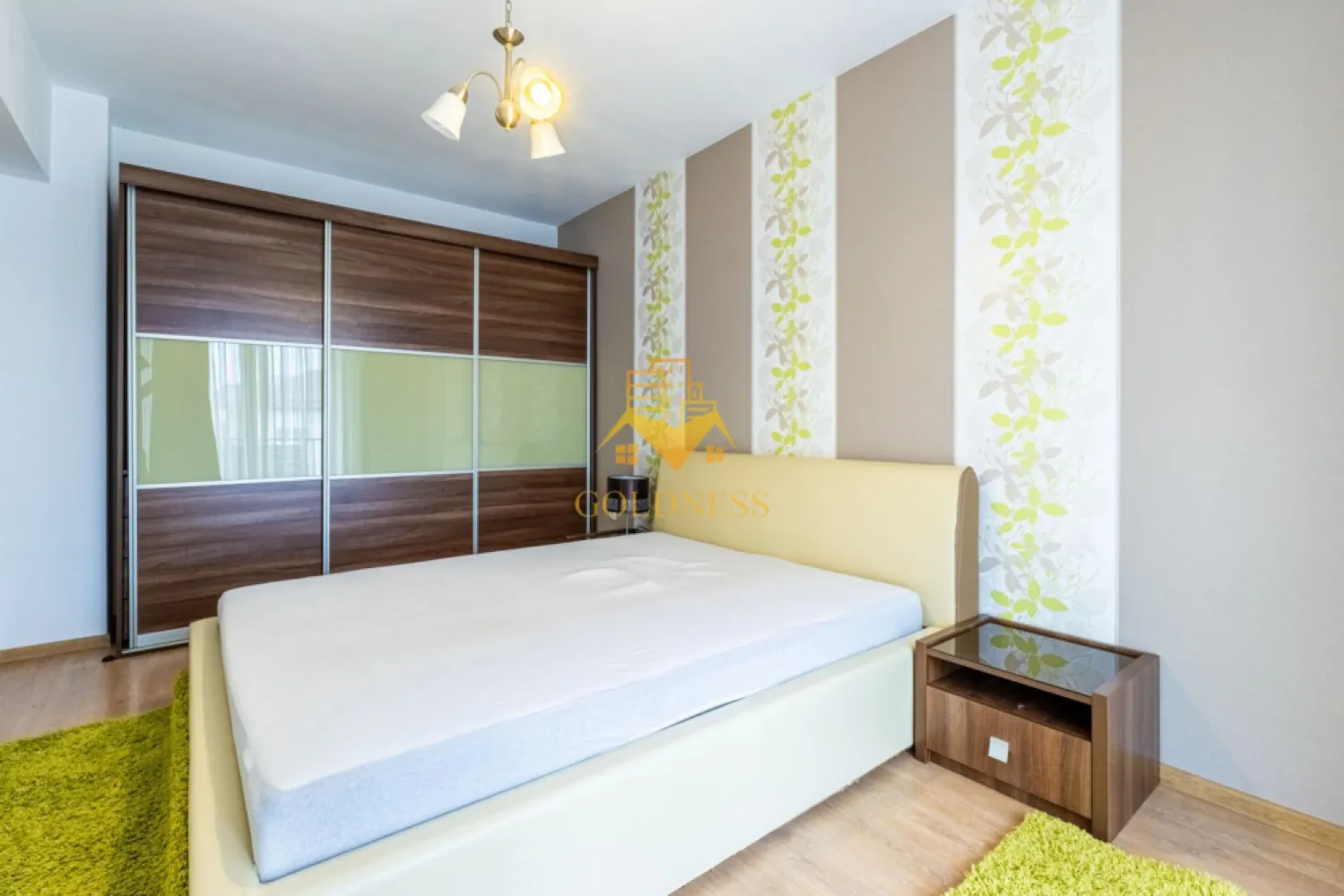 2 camere, modern, garaj, bloc nou,Buna Ziua, Bonjour Residence, Sophia - GOLDNESS Imobiliare vă propune spre închiriere un apartament cu 2 camere complet mobilat și utilat, la etajul 2 într-un imobil de 8 etaje, în Cartierul Buna ZIua. Dispune de loc de parcare exterioara! Se află în apropierea stațiilor de transport în comun, magazine, restaurante, spații verzi, farmacii, etc. Apartamentul este compartimentat astfel: - dormitor cu pat matrimonial, noptiere, spatiu pentru depozitare - living cu canapea exntesibila, spatiu pentru depozitare, TV, dressing - bucatarie complet mobilata, utilata, loc de luat masa - baie cu cada, calorifer port prosop și dulap pentru depozitare. - terasa de 12 mp. Imobilul este dotat cu toate cele necesare- centrală proprie, mașină de spălat haine, frigider, plită electrică, hotă, etc. Dacă sunteți interesați de acest apartament și doriți să îl vizionați, dar și pentru alte oferte nu ezitați să ne contactați telefonic sau prin e-mail. Vă stăm la dispoziție! Pentru intermediere se percepe un comision de 50% din prețul chiriei!