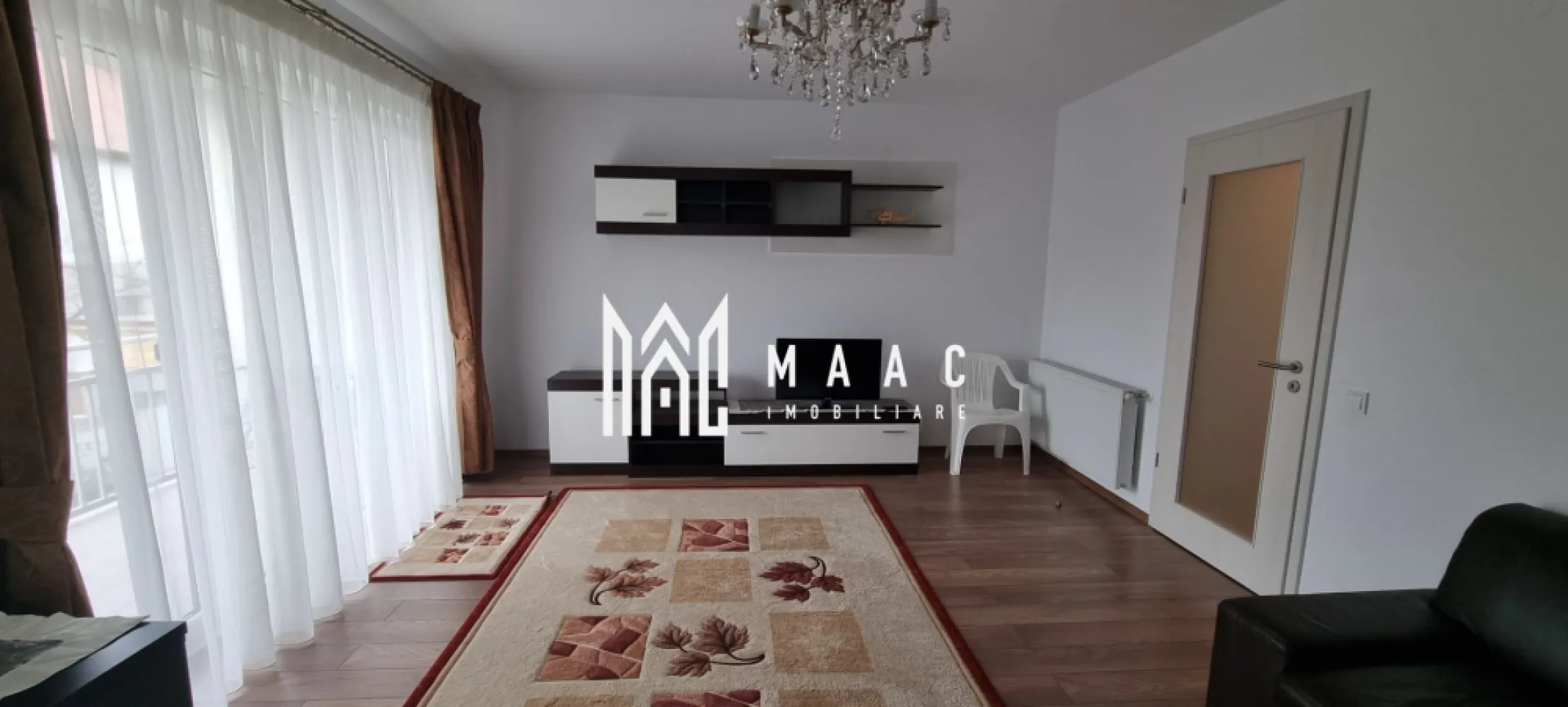 Apartament 2 camere I 76mpu I Etajul 1 I Sub Arini - MAAC Imobiliare vă propune pentru închiriere un apartament deosebit, situat în proximitatea parcului Sub Arini, una dintre cele mai apreciate zone din Sibiu. Acest apartament se află la etajul 1 al unei vile recent construite, beneficiind de parcare privată. Construcția este amplasată în interiorul terenului, oferind astfel un spațiu privat și liniște deplină. Caracteristici principale: - Suprafață generoasă: 76 mpu, inteligent compartimentată. - Hol de acces, cu spațiu pentru depozitare. - Bucătărie închisă, complet echipată. - Baie, cu geam pentru aerisire. - Living spațios. - Dormitor generos. Apartamentul se închiriază complet mobilat și utilat. Dotări moderne, confort sporit. Ideal pentru cei care caută o locuință complet utilată, într-o zonă privată. Condiții de închiriere: - Închiriere pe termen lung. - La semnarea contractului, se achită chiria in avans și o lună garanție. - Nu se acceptă animale de companie. Parcul Sub Arini este ideal pentru plimbări cu bicicleta sau role și diverse jocuri de agrement. În imediata sa apropiere se află stadionul municipal Sibiu, terenuri de tenis și bazinul de înot Olimpia. Pentru mai multe informații, precizați că ați văzut anunțul cu ID: CP2319669