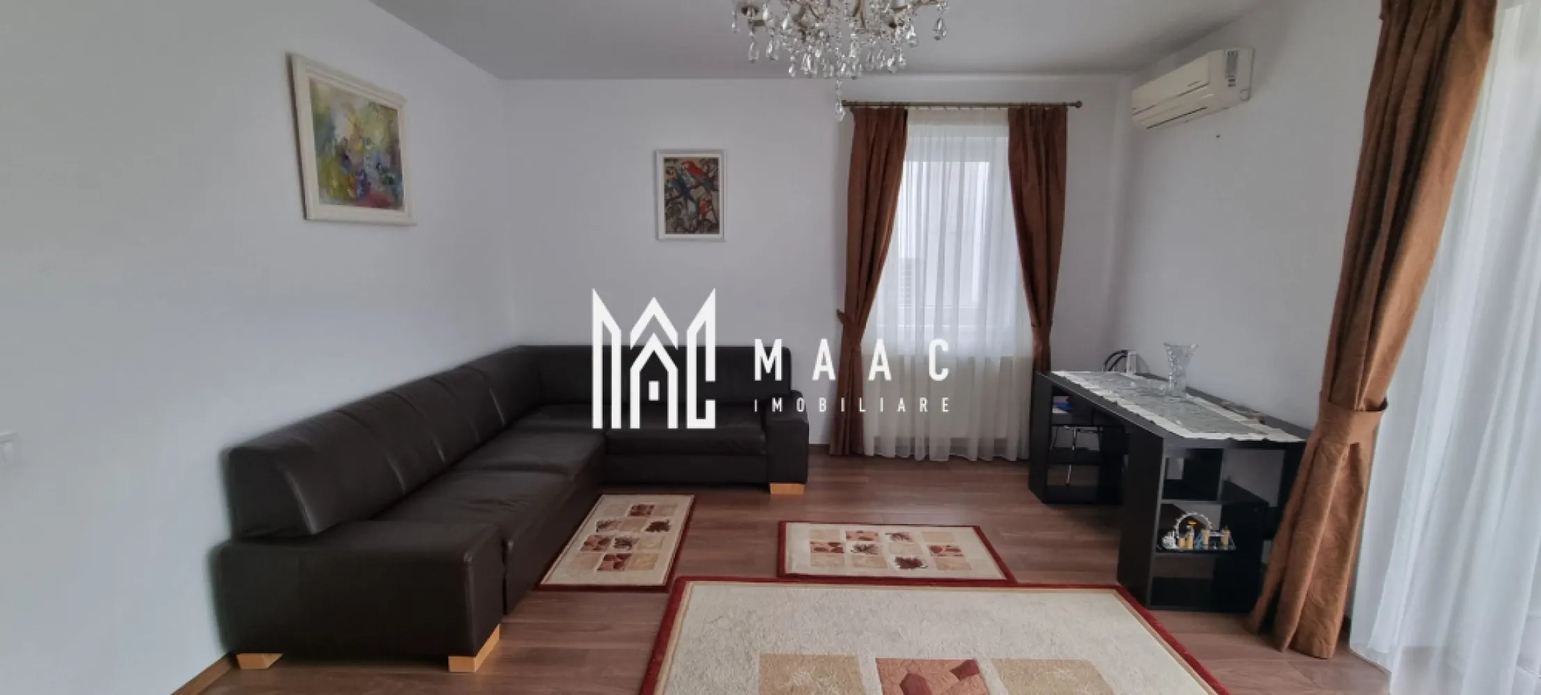 Apartament 2 camere I 76mpu I Etajul 1 I Sub Arini - MAAC Imobiliare vă propune pentru închiriere un apartament deosebit, situat în proximitatea parcului Sub Arini, una dintre cele mai apreciate zone din Sibiu. Acest apartament se află la etajul 1 al unei vile recent construite, beneficiind de parcare privată. Construcția este amplasată în interiorul terenului, oferind astfel un spațiu privat și liniște deplină. Caracteristici principale: - Suprafață generoasă: 76 mpu, inteligent compartimentată. - Hol de acces, cu spațiu pentru depozitare. - Bucătărie închisă, complet echipată. - Baie, cu geam pentru aerisire. - Living spațios. - Dormitor generos. Apartamentul se închiriază complet mobilat și utilat. Dotări moderne, confort sporit. Ideal pentru cei care caută o locuință complet utilată, într-o zonă privată. Condiții de închiriere: - Închiriere pe termen lung. - La semnarea contractului, se achită chiria in avans și o lună garanție. - Nu se acceptă animale de companie. Parcul Sub Arini este ideal pentru plimbări cu bicicleta sau role și diverse jocuri de agrement. În imediata sa apropiere se află stadionul municipal Sibiu, terenuri de tenis și bazinul de înot Olimpia. Pentru mai multe informații, precizați că ați văzut anunțul cu ID: CP2319669