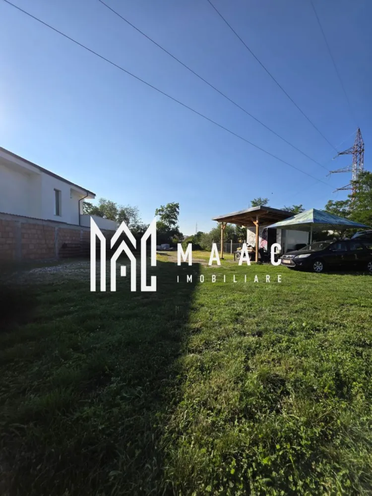 Teren Intravilan I609mp I Investitie I Imprejmuit I Turnisor - MAAC Imobiliare va prezinta un teren cu suprafata de 609 mp, Intravilan, situat intr-o zona in plina dezvoltare. Terenul este situat intr-o curte privata, cu acces pe poarta automatizata cu telecomanda. Imprejmuit. Toate actele puse la punct - pregatit pentru contructie imediata ( casa unifamiliala ) Zona ideala - acces rapid spre oras, ferita de trafic Nu necesita PUZ . Ideal pentru investitie Disponibil imediat, liber de sarcini Pentru mai multe detalii sau vizionari mentionati ID: CP2663720 }}