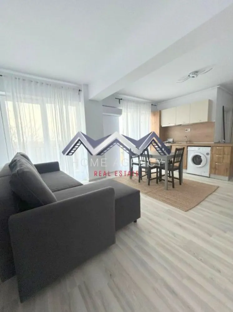 Apartament 2 camere Otopeni | prima închiriere - Vă propunem, spre închiriere, un apartament modern și foarte cochet, complet mobilat și utilat, situat la etajul 2/3 într-un bloc nou, poziționat excelent în Otopeni, cu acces rapid către DN1, Centură, Aeroport și toate punctele de interes din zonă.

✨ Detalii apartament:
- Living cu bucătărie open space, luminos, cu acces direct către balcon
- Dormitor confortabil, perfect pentru relaxare
- Baie modernă, dotată cu duș walk-in
- Hol generos, ideal pentru spații de depozitare
- Prima închiriere — totul este impecabil, ca nou
- 1 loc de parcare inclus în preț
- Stație de autobuz în fața complexului

Apartamentul este amenajat cu atenție la detalii, oferind un ambient cald, modern și funcțional. Perfect pentru o persoană sau un cuplu care își dorește confort, liniște și o locație excelentă.

📞 Contactează-mă pentru detalii sau pentru a programa o vizionare!