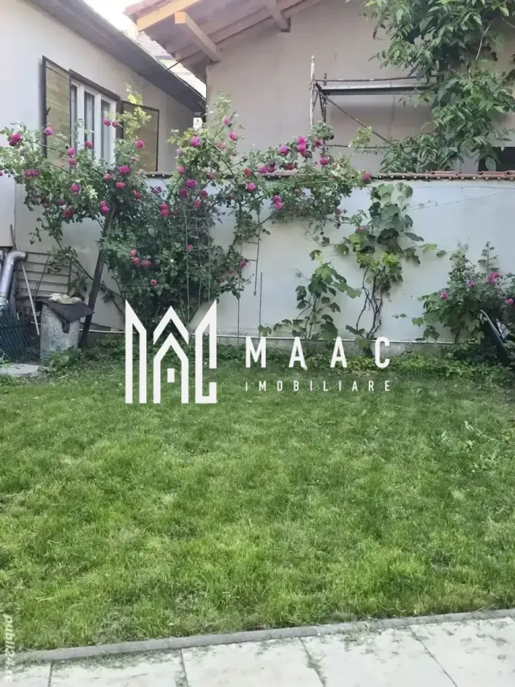 Casa individuala | Acces Auto | Teren 460MP | C. Dumbravii - MAAC Imobiliare va prezinta o Casă individuală cu potențial in Zona Calea Dumbrăvii.

Caracteristici:
Tip proprietate: Casă individuală, construcție din cărămidă cu fundație solidă, consolidată cu subzidire
Suprafață utilă: 228 mp
Teren: 460 mp
Compartimentare actuală: Demisol, Parter, Pod înalt
Deschidere la stradă: 10 m
Orientare: Soare pe tot parcursul zilei (răsărit – apus)

Locație:
Situată în zona Calea Dumbrăvii, una dintre cele mai căutate zone rezidențiale din Sibiu

Configurație flexibilă – 2 opțiuni de utilizare
Pentru familie extinsă - posibilitate de împărțire la parter în 2 apartamente distincte, fiecare cu 2 camere, baie proprie, intrare separată
Demisol cu 2 camere, baie comună, bucătărie, atelier, pivnițe și 2 intrări separate

Pentru investitori / dezvoltatori:
Posibilitate extindere construcție existentă cu 2 etaje suplimentare sau etaj + mansardă
Posibilitate de nouă construcție pe terenul disponibil:
amprentă 90 mp
demisol + 2 etaje

Compartimentare actuală:
Demisol - Hol, bucătărie, 2 camere, baie cu cadă, atelier. pivnițe cu acces separat

Parter - Hol, 4 camere. 2 băi cu cabină de duș, două intrări (față și lateral) – ideal pentru separare în apartamente

Pod - Înalt, complet separat de podul vecinului cu zid de cărămidă

Dotări și finisaje:
Încălzire centrală pe gaz, calorifere din fontă și oțel
Curte pavată cu plăci de granit (2023)
Grădină amenajată (~300 mp) cu:
Filigorie, grătar, gazon
Zmeură, mure, căpșuni, păr
Viță de vie pe boltă (200-250 litri vin/an)
Trandafiri cățărători și de Damasc

Pentru mai multe informatii, va rog sa ne contactati si sa specificati ID: CP2649238