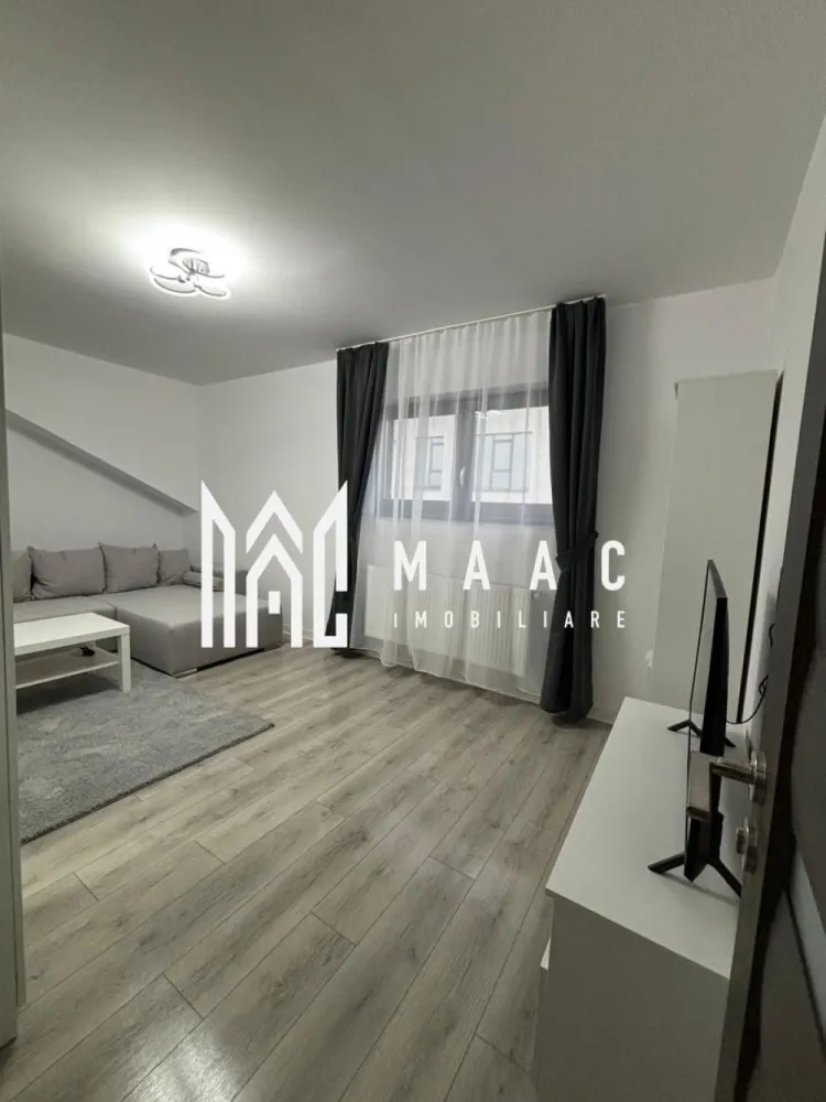 Apartament 2 camere | 52 MPU | Etaj 3 | Decomandat | D. Stanca - MAAC Imobiliare vă propune spre vânzare un apartament modern cu 2 camere, situat la etajul 3 al unui imobil nou, construit în 2022, prevăzut cu pod deasupra, oferind un plus de confort termic și intimitate.

Locuința este bine compartimentată și se vinde exact ca în poze, fiind ideală pentru mutare imediată sau investiție.

Compartimentare:
Hol
Living
Dormitor
Bucătărie
Baie cu geam

Apartamentul beneficiază de un ambient plăcut, finisaje moderne și o organizare practică a spațiului.

Dotări și avantaje:
Bloc construit în 2022
Etaj 3
Pod deasupra 
Se vinde complet mobilat și utilat
Mobilier modern
Televizor inclus
Mașină de spălat haine
Masina de spalat vase
Baie cu geam

Pentru mai multe detalii sau programarea unei vizionări, nu ezitați să ne contactați specificand ID: CP3063169
