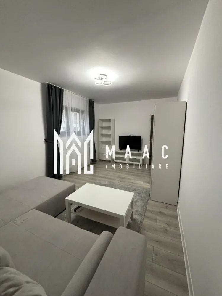 Apartament 2 camere | 52 MPU | Etaj 3 | Decomandat | D. Stanca - MAAC Imobiliare vă propune spre vânzare un apartament modern cu 2 camere, situat la etajul 3 al unui imobil nou, construit în 2022, prevăzut cu pod deasupra, oferind un plus de confort termic și intimitate.

Locuința este bine compartimentată și se vinde exact ca în poze, fiind ideală pentru mutare imediată sau investiție.

Compartimentare:
Hol
Living
Dormitor
Bucătărie
Baie cu geam

Apartamentul beneficiază de un ambient plăcut, finisaje moderne și o organizare practică a spațiului.

Dotări și avantaje:
Bloc construit în 2022
Etaj 3
Pod deasupra 
Se vinde complet mobilat și utilat
Mobilier modern
Televizor inclus
Mașină de spălat haine
Masina de spalat vase
Baie cu geam

Pentru mai multe detalii sau programarea unei vizionări, nu ezitați să ne contactați specificand ID: CP3063169
