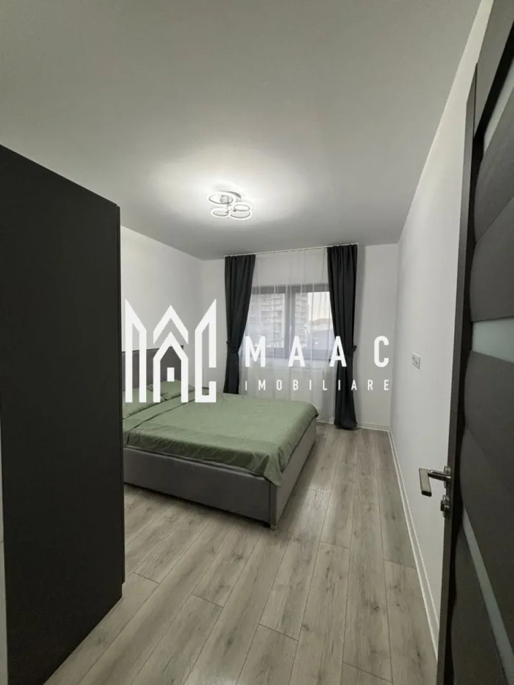 Apartament 2 camere | 52 MPU | Etaj 3 | Decomandat | D. Stanca - MAAC Imobiliare vă propune spre vânzare un apartament modern cu 2 camere, situat la etajul 3 al unui imobil nou, construit în 2022, prevăzut cu pod deasupra, oferind un plus de confort termic și intimitate.

Locuința este bine compartimentată și se vinde exact ca în poze, fiind ideală pentru mutare imediată sau investiție.

Compartimentare:
Hol
Living
Dormitor
Bucătărie
Baie cu geam

Apartamentul beneficiază de un ambient plăcut, finisaje moderne și o organizare practică a spațiului.

Dotări și avantaje:
Bloc construit în 2022
Etaj 3
Pod deasupra 
Se vinde complet mobilat și utilat
Mobilier modern
Televizor inclus
Mașină de spălat haine
Masina de spalat vase
Baie cu geam

Pentru mai multe detalii sau programarea unei vizionări, nu ezitați să ne contactați specificand ID: CP3063169