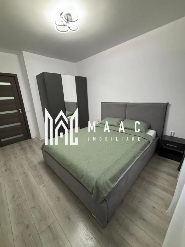 Apartament 2 camere | 52 MPU | Etaj 3 | Decomandat | D. Stanca - MAAC Imobiliare vă propune spre vânzare un apartament modern cu 2 camere, situat la etajul 3 al unui imobil nou, construit în 2022, prevăzut cu pod deasupra, oferind un plus de confort termic și intimitate.

Locuința este bine compartimentată și se vinde exact ca în poze, fiind ideală pentru mutare imediată sau investiție.

Compartimentare:
Hol
Living
Dormitor
Bucătărie
Baie cu geam

Apartamentul beneficiază de un ambient plăcut, finisaje moderne și o organizare practică a spațiului.

Dotări și avantaje:
Bloc construit în 2022
Etaj 3
Pod deasupra 
Se vinde complet mobilat și utilat
Mobilier modern
Televizor inclus
Mașină de spălat haine
Masina de spalat vase
Baie cu geam

Pentru mai multe detalii sau programarea unei vizionări, nu ezitați să ne contactați specificand ID: CP3063169