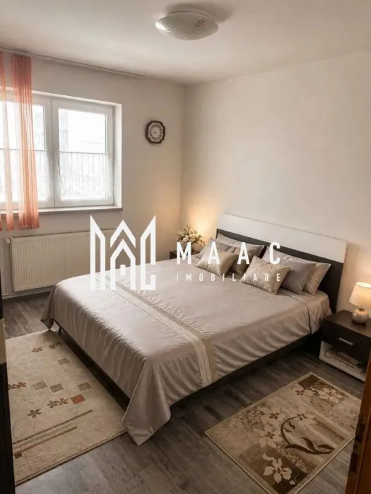 Apartament 2 camere | Etaj 2 | Decomandat | Cisnadie - MAAC Imobiliare vă prezintă spre vânzare un apartament cu 2 camere, situat la etajul 2, în Cisnădie, o zonă liniștită, cu acces facil către punctele de interes.

Caracteristici:
Suprafață utilă: 45 mp
Etaj: 2/4
Compartimentare: decomandat
Încălzire prin centrală termică proprie și calorifere

Compartimentare:
Dormitor
Living
Bucătărie
Baie
Hol de acces.

Dotări:
Apartamentul dispune de centrală termică proprie

Avantaje:
Ideal atât pentru locuință proprie, cât și pentru investiție.

Pentru mai multe detalii specificati telefonic ca ati vazut anuntul cu ID: CP3064795