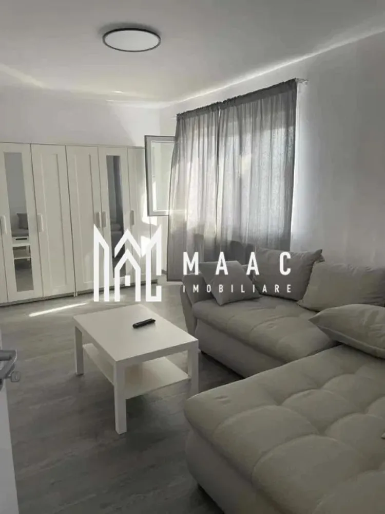 Apartament 2 Camere I Decomandat I Modern I Terezian - Se oferă spre închiriere apartament cu 2 camere decomandate, situat la etajul 4 din 4 al unui imobil din zona Terezian, o locație apreciată pentru accesibilitate, liniște și proximitatea față de facilitățile urbane.

Locuința impresionează prin amenajarea modernă, fiind complet pregătită pentru mutare imediată.

Caracteristici:
2 camere decomandate
Etaj 4 din 4
Design modern
Complet mobilat și utilat
Pivniță inclusă – spațiu suplimentar de depozitare
Compartimentare practică și eficientă

Avantaje:
Disponibil imediat
Se închiriază pe termen lung
Ideal pentru cupluri, persoane singure sau profesioniști

Zonă bine conectată la transport public, magazine și puncte de interes

Apartament luminos și bine întreținut

O locuință modernă, confortabilă și complet echipată, potrivită pentru cei care își doresc stabilitate și confort într-o zonă apreciată din Sibiu.

Pentru informati si vizionari: CP3064237