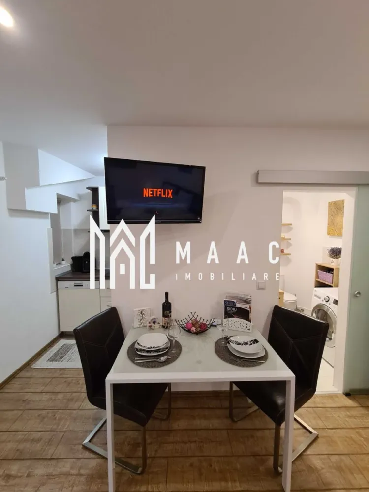 BLACK FRIDAY Garsoniera/ Studio | Investitie | Ultracentral - 🔥 BLACK FRIDAY - Profită de cea mai bună perioadă din an pentru a deveni proprietar! Reducere de 3.000 euro - Pret vechi - 105.000 euro Pret promotional - 102.000 euro MAAC Imobiliare ofera spre vanzare apartament cu 1 camera elegant, complet mobilat si utilat, in zona Ultracentrala (la 1 minut de mers pe jos de inima orasului, Piata Mare). Locuinta se afla la parterul unui imobil izolat si bine pozitionat cu regim de inaltime P+2, este alcatuita dintr-o incapere cu pat matrimonial si canapea extensibila, baie moderna si bucatarie cu toate facilitatile. Se afla intr-o curte comuna cu 4 locatari, avand geam la curte. Langa cafeneaua 5TOGO. Locatia este linistita, primitoare si aranjata modern. Amplasamentul imobilului este unul avantajos, aflandu-se la 5 minute de mers pe jos de spital, centru si Promenada Mall. Locația este dotata cu: - Sistem smart de intrare pe poarta principala cu cod unic si safe separat unde se afla cheile de intrare, pe holul principal. - Saltea Gama Hoteliera Super Ortopedica Memory, Biomedical 180x200 cm - Este o saltea silentioasa, ferma, fara arcuri, având un confort deosebit. - Canapea extensibila 3 locuri cu suprafata de dormit: 144x194 cm - Smart TV si internet. - Cafetiera Tassimo. - Fierbător de apa. - Vesela pentru 4 persoane, tacâmuri, tirbușon, pahare de vin și apă, oale și tigaie, boluri și alte ustensile pt bucătărie - Masina de spălat vase - Plita electrica - Frigider și cuptor cu microunde - Masina de spălat rufe, uscător de rufe automat - Dezumidificator Trotec - Fier de călcat și masă de călcat Apa calda este funizata de un boiler de 100l, incalzirea in locuinta se efectuează prin panourile electrice agatate pe pereti, cu termostat care se controleaza prin aplicație telefon la distanta. De 6 ani funcționeaza in regim hotelier cu mult succes. Pentru mai multe detalii sau pentru a programa o vizionare, va rugam specificati telefonic: CP2590867 }}