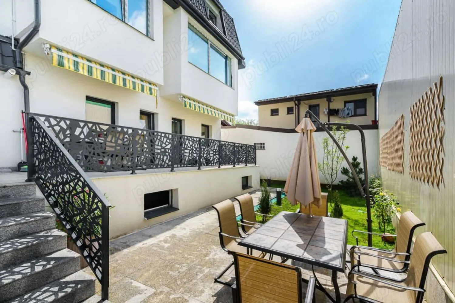 Vand apartament 5 camere ,200mp ,parter + curte proprie 150 mp - Vand apartament parter cu 5 camere,3 bai la parter cu suprafata de 200 mp.Apartmentul se afla intr-un imobil tip boutique D+P+1+M cu 4 unitati,cate una pe fiecare etaj si are curtie proprie de 150 mp.Apartamentul se afla in zona Bucurestii Noi,sectorul 1,intr o zona linistita .In apropiere avem complexul comercial Colosseum si tot in apropiere metrou si alte mijloace de transport.