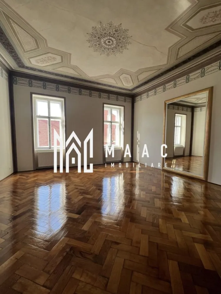 Apartament 3 camere I Etajul 2 I Zona Piata Mare - MAAC Imobiliare propune spre închiriere un apartament elegant, situat in proximitatea Pietei Mari. Locuinta, renovata recent, este disponibila imediat si se preteaza ca rezidenta dar si ca spatiu pentru birouri. Initial, locatia se preda nemobilata (ca in foto) dar exista disponibilitate din partea proprietarului pentru a mobila. Cuprinde 3 incaperi generoase, bucatarie inchisa, baie, hol de acces, dressing. Aferent- spatiu de depozitare in pod, in beci si inca o camera tehnica, separata, ce adaposteste centrala termica pe gaz. Apartamentul va fi mobilat și pregătit pentru predare în luna august. Se percepe garantie in cuantumul a doua luni de chirie si chirie in avans. Se poate parca in curtea interioara a cladirii. Amplasarea in zona ultracentrala, dimensiunea, compartimentarea, multitudinea posibilitatilor de exploatare a potentialului acestui apartament reprezinta atu-uri importante pentru aceasta proprietate. Pentru informații sau vizionari, va rugam specificați telefonic: CP2586762 }}