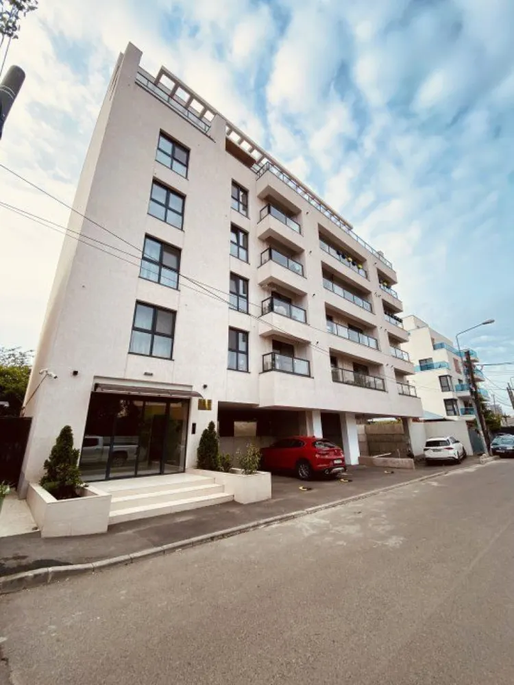 Penthouse în complexul Conest Edifici Mihai Bravu - Descoperiţi luxul suprem în acest penthouse impresionant situat la ultimul etaj al complexului rezidenţial Conest Edifici Mihai Bravu. Cu o suprafaţă utilă de 159 mp şi o suprafaţă construită de 198 mp, acest apartament de 4 camere oferă spaţiu generos şi confort de neegalat.

Detalii complex:

 o Localizare excelentă: Situat în zona Vitan din sectorul 3, complexul beneficiază de acces facil la mijloacele de transport în comun, inclusiv la staţia de metrou Mihai Bravu, aflată la doar 6 minute de mers pe jos .
 o Facilităţi moderne: Complexul oferă lifturi Schindler de ultimă generaţie, parcări subterane pe platforme Klaus, şi acces securizat cu videointerfon şi barieră telecomandată .
 o Conectivitate: Aproape de magazine, sucursale bancare, şcoli şi grădiniţe, şi la doar 3,7 km de Piaţa Unirii .

Dotări şi finisaje:

 o Structură şi siguranţă: Construcţia are o fundaţie solidă de tip radier general, pereţi exteriori din cărămidă Porotherm şi izolaţie termică cu vată bazaltică de 10 cm, asigurând durabilitate şi eficienţă energetică .
 o Confort termic şi acustic: Tâmplăria exterioară din profil PVC Salamander cu geam triplu securizat, instalaţiile de încălzire prin pardoseală Shuller şi climatizarea cu aparate de aer condiţionat Daikin şi Mitsubishi oferă confort sporit pe tot parcursul anului .
 o Finisaje de calitate: Pardoselile sunt placate cu gresie antiderapantă şi parchet stratificat de înaltă calitate, uşile interioare şi de intrare sunt importate din Italia, iar spaţiile comune sunt finisate cu granit şi gresie .

Utilităţi şi facilităţi adiţionale:

 o Instalaţii moderne: Fiecare apartament beneficiază de contorizări individuale pentru apă, gaz şi electricitate, furnizate de ApaNova, Enel şi Engie .
 o Sisteme de siguranţă: Apartamentele sunt echipate cu sisteme de detectare a incendiilor şi videointerfon pentru securitate maximă .

Acest penthouse reprezintă o oportunitate rară de a locui într-un spaţiu luxos, cu toate facilităţile moderne la îndemână. Pentru mai multe detalii şi vizionări, vă rugăm să ne contactaţi.

Caracteristici principale:

 o Suprafaţă utilă: 159mp
 o Suprafaţă construită: 198mp
 o Camere: 4 camere luminoase şi spaţioase
 o Etaj: Ultimul etaj al clădirii
 o Complex rezidenţial: Conest Edifici Mihai Bravu

Detalii suplimentare:

 o Living generos, perfect pentru momente de relaxare şi socializare
 o Bucătărie modernă, complet utilată, ideală pentru pasionaţii de gătit
 o Dormitoare elegante, fiecare cu un design sofisticat şi finisaje de înaltă calitate
 o Băi contemporane, echipate cu cele mai bune accesorii şi finisaje
 o Terasă panoramică, oferind vederi spectaculoase asupra oraşului
 o Locuri de parcare private, pentru confortul şi siguranţa dvs.

Facilităţi ale complexului:

 o Pază şi securitate 24/7
 o Acces controlat
 o Zone verzi şi spaţii de relaxare
 o Loc de joacă pentru copii
 o Proximitate faţă de mijloace de transport, centre comerciale şi instituţii de învăţământ

Nu rataţi ocazia de a vă muta într-un apartament de vis, perfect pentru cei care apreciază luxul şi confortul. Pentru mai multe informaţii sau pentru a programa o vizionare, vă rugăm să ne contactaţi.