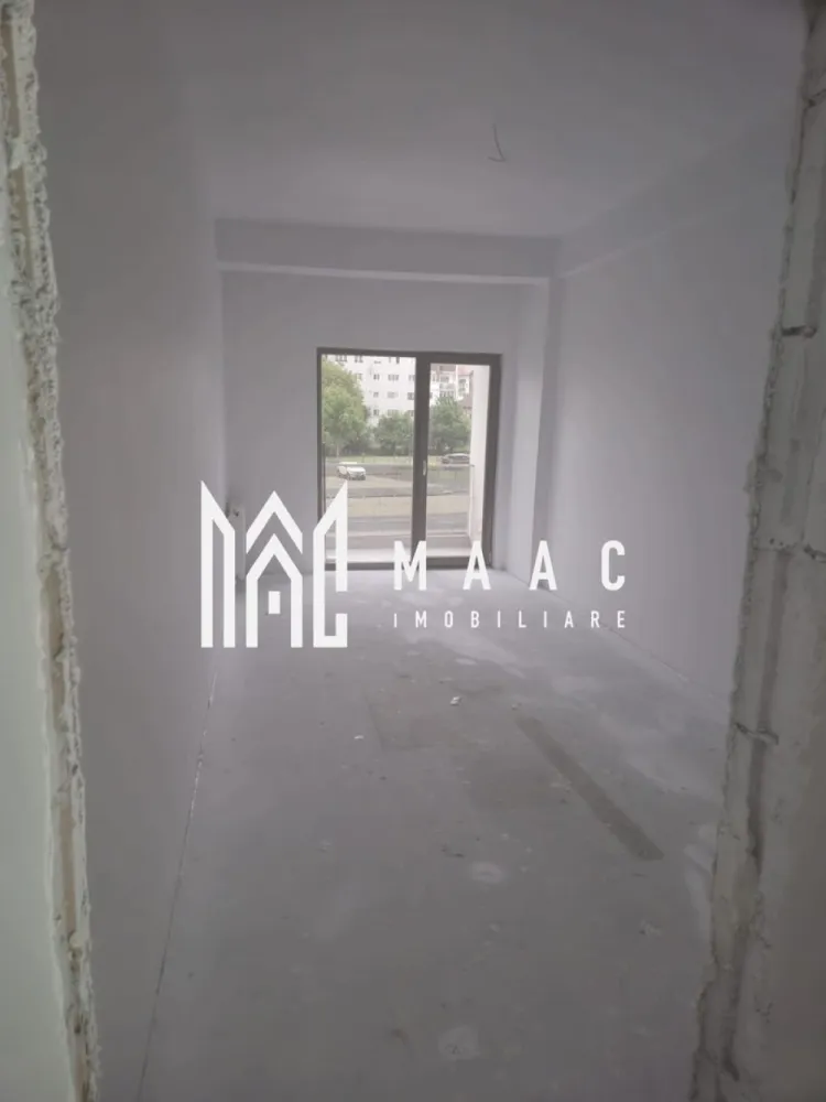 Apartament 2 camere | Decomandat | Etaj 1 | Doamna Stanca - MAAC Imobiliare vă propune spre vânzare un apartament modern cu 2 camere, situat pe strada Doamna Stanca, într-un bloc nou cu regim de înălțime P+3, în Sibiu. Detalii proprietate: Suprafață utilă: 52 mp Etaj: 1 din 3 Compartimentare: decomandat Living generos și luminos cu bucătărie open space Dormitor spațios Baie elegantă Balcon cu acces atât din living, cât și din dormitor – ideal pentru relaxare Loc de parcare inclus Apartamentul este situat într-un bloc nou, într-o zonă în plină dezvoltare, ideală pentru locuit sau investiție. Se predă la cheie, cu finisaje moderne, pregătit pentru a fi locuit imediat, fără investiții suplimentare. Poziționat excelent, în apropierea zonei comerciale și cu acces rapid către toate punctele de interes din oraș. Pentru mai multe informații sau pentru a stabili o vizionare precizati telefonic anuntul cu ID: CP2565521. www.maac.ro Sediu: Str. Oituz , Nr. 12 }}