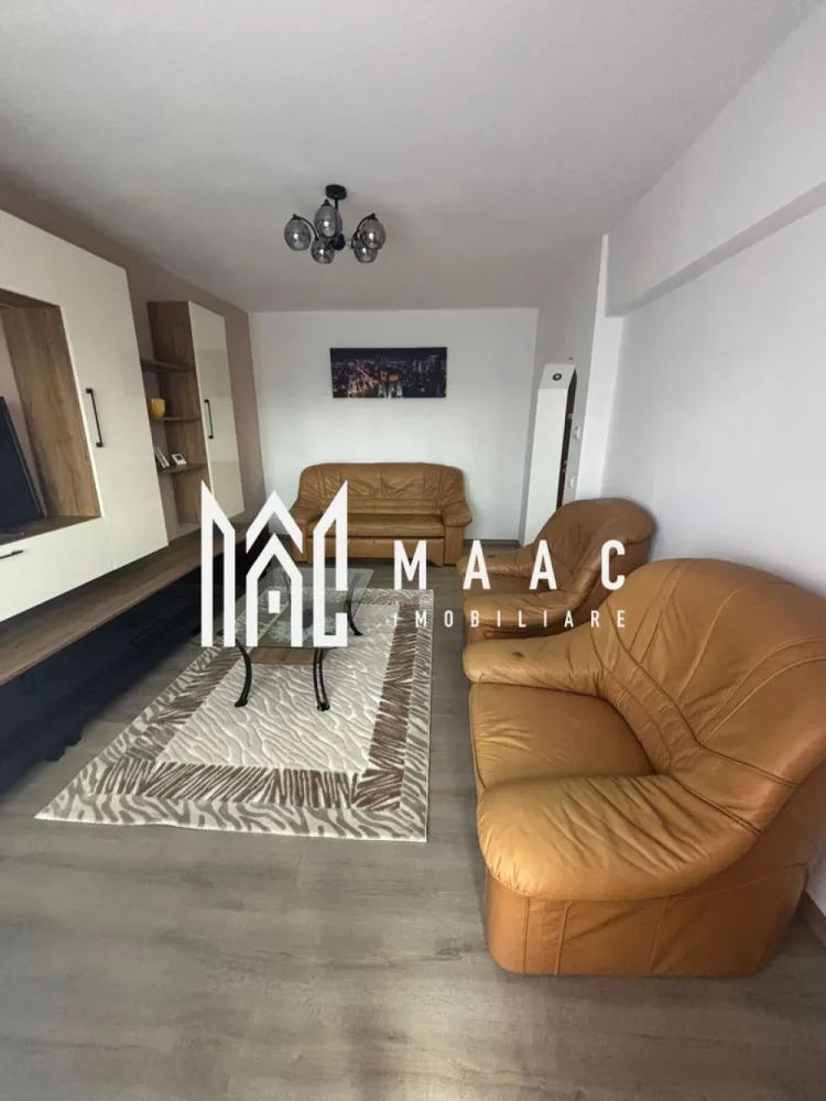 Apartament 2 camere | Decomandat | Etaj 2 | Balcon | Pivniță | Ștrand - Maac Imobiliare prezintă un apartament spațios și complet decomandat, situat la etajul 2 din 4 al unui bloc bine întreținut din cartierul Ștrand. Locuința dispune de o suprafață totală de 71 mp, din care 61 mp utili și balcon generos de 10 mp, perfect pentru momentele de relaxare. Apartamentul a fost renovat recent, inclusiv instalația electrică și cea termică, oferind un confort modern și siguranță. Este compus din două camere mari, bucătărie separată, baie cu geam, hol spațios și balcon închis. Se vinde mobilat și utilat complet, exact ca în fotografii – gata de mutat! Beneficiază de o pivniță mare, ideală pentru depozitare suplimentară, și se află într-o zonă foarte bine dezvoltată, cu acces facil către: stații de autobuz, școli și grădinițe, magazine și farmacii, parc și alte facilități de cartier. Ideal pentru locuit sau investiție! Pentru mai multe detalii specificati ca ati vazut anuntul cu ID: CP2539690 }}