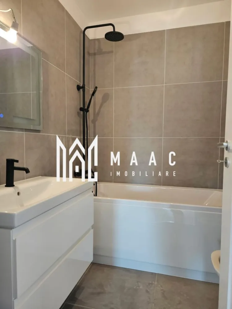 Apartament 3 camere I 64 mp I Sibiu I Doamna Stanca I 2 băi I balcon 10 mp - MAAC Imobiliare vă propune un apartament modern cu 3 camere, situat pe Strada Doamna Stanca, într-o zonă în plină dezvoltare din Sibiu.

Compartimentare:
living + bucătărie: 29,78 mp
dormitor 1: 13,59 mp
dormitor 2: 10,22 mp
2 băi
balcon: 10,47 mp

Apartamentul este bine compartimentat, ideal pentru locuință proprie sau investiție.

Prețuri:
119.200 euro (TVA inclus) – semifinisat
128.800 euro (TVA inclus) – finisat la cheie

Loc de parcare exterior inclus
Opțional: parcare interioară – 10.900 euro

Centrală termică
Apartament racordat la toate utilitățile
Predare la cheie (pentru varianta finisată)
Ansamblu rezidențial nou

Zona Doamna Stanca oferă acces rapid către centre comerciale, magazine, școli și principalele puncte de interes din oraș, fiind una dintre cele mai căutate zone noi din Sibiu.

Pentru mai multe informații sau pentru programarea unei vizionări, vă rugăm să ne contactați și să menționați ID-ul proprietății: CP3048564.