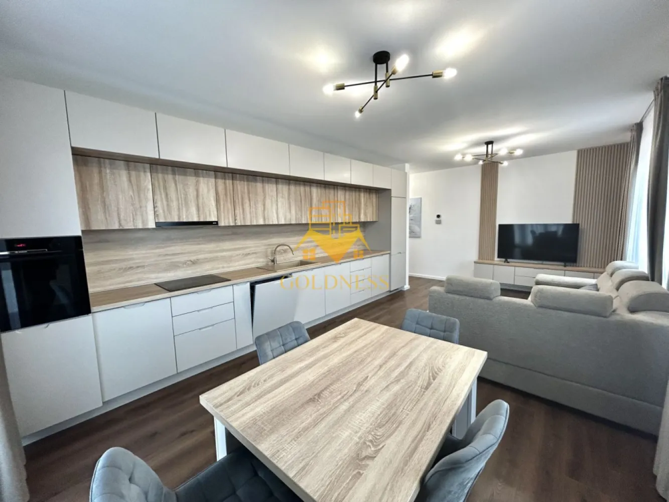 2 camere, Modern, Parcare, Bloc nou, Liberty Park, Semicentral, Gara - GOLDNESS Imobiliare vă propune spre închiriere un apartament cu 2 camere complet mobilat și utilat, la etajul 4 într-un imobil de 6 etaje, în zona Semicentrala.
Dispune de loc de parcare subterana!
Se află în apropierea stațiilor de transport în comun, magazine, restaurante, spații verzi, farmacii, etc. 

Apartamentul este compartimentat astfel:
 - dormitor cu pat matrimonial, dressing, noptiere
 - living cu bucatarie open space complet utilată, canapea extensibilă, loc de servit masa 
 - baie cu cabina de dus, calorifer port prosop și dulap pentru depozitare.
 - terasa de 10 mp.

Imobilul este dotat cu toate cele necesare- mașină de spălat haine, frigider, plită electrică, hotă, etc. 
Dacă sunteți interesați de acest apartament și doriți să îl vizionați, dar și pentru alte oferte nu ezitați să ne contactați telefonic sau prin e-mail. Vă stăm la dispoziție!
Pentru intermediere se percepe un comision de 50% din prețul chiriei!