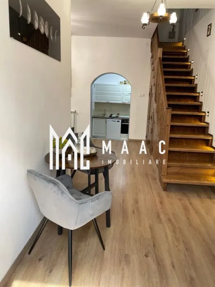 Apartament la casa | P+M | 110MP | Pivnita | Calea Dumbravii - MAAC Imobiliare va prezinta un apartament la casa Parter+Mansardă in zona Calea Dumbravii.

Caracteristici principale:
Situat într-o zonă pitorească, în zona Calea Dumbrăvii.
Suprafața utilă de 110 mp, ideală pentru confort.
4 camere, 3 dormitoare, oferind opțiuni multiple pentru organizarea locuinței.
2 băi, asigurând confort și comoditate pentru întreaga familie.

Configurația apartamentului:
Parterul include livingul open space cu bucătăria integrată.
Baie la parter pentru confortul și accesibilitatea locuitorilor.
La etaj se găsesc 2 camere suplimentare și o baie.

Amenajări și dotări suplimentare:
Terasă de 20 mp, perfectă pentru momente de relaxare în aer liber.
Pivniță uscată de 50 mp, ideală pentru depozitare și organizare suplimentară.
Loc de parcare în fața imobilului, asigurând comoditate și accesibilitate.
Centrală termică proprie și calorifere pentru încălzire eficientă în sezonul rece.

Funcționare în regim hotelier:
În prezent, apartamentul operează în regim hotelier, oferind oportunitatea de investiție pentru venituri suplimentare.

Pentru mai multe detalii precizati telefonic ca ati vazut anuntul cu ID:CP2021218.