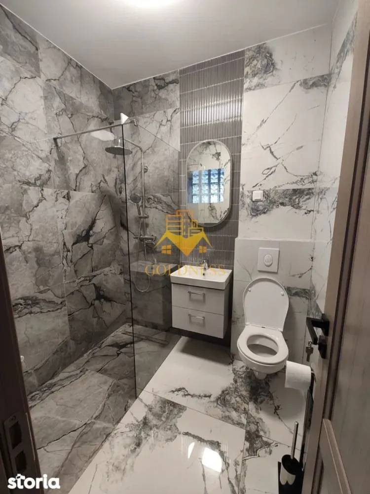 Casă de închiriat, 5 camere, 150 mp curte , parcare, Parcul Armătura - GOLDNESS Imobiliare vă propune spre închiriere o casă spațioasă cu o suprafață utilă de 118 mp, situată în cartierul Iris, pr strada Oașului, ideală pentru sediu de firmă, birouri sau locuit.
Casa dispune de urmatoarea cofiguratie si se poate mobila la cerere:
- La parter (91 mp): 3 dormitoare, 1 birou/dressing, baie, bucătărie, cămară și un hol spațios (configurabil ca living).

- La demisol (27 mp): 2 camere suplimentare, ideale pentru depozitare, hobby sau spațiu tehnic.

- Exterior: Curte interioară privată, garaj și loc de parcare suplimentar (de la primărie).

- Sistem energetic: Panouri fotovoltaice (7 KW) și stocare în baterii (10 KW) – costuri minime de întreținere.

- Confort: Aer condiționat, renovare recentă (în curs de finalizare).

- Proximitate: Parcul Armătura (recent modernizat) și viitorul Mall Rivius.

- Mobilitate: Acces rapid la tramvai (linia 102) și alte mijloace de transport.

Dacă sunteți interesați de această vilă și doriți să o vizionați, dar și pentru alte oferte nu ezitați să ne contactați telefonic sau prin e-mail. Vă stăm la dispoziție!

Pentru intermediere se percepe un comision de 50% din prețul chiriei!