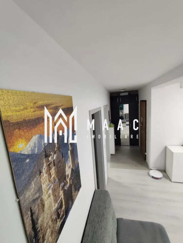 Apartament 3 camere | Etaj 2 | 2 Balcoane | Calea Surii Mici - MAAC Imobiliare vă propune spre vânzare un apartament cu 3 camere, situat într-o zonă liniștită și în plină dezvoltare – Calea Șurii Mici, în ansamblul rezidențial Kastani Residence, Sibiu. Etaj: 2/3 Suprafață utilă: 55 mp 2 balcoane: 3 mp și 7 mp Loc de parcare privat inclus Complet mobilat și utilat Proprietatea este ideală atât pentru locuit, cât și ca investiție, fiind atent compartimentată pentru confort și funcționalitate. Se vinde așa cum se prezintă în fotografii – cu mobilier de calitate și electrocasnice incluse. Avantaje: Compartimentare eficientă: living cu bucătărie open space, 2 dormitoare, baie, 2 balcoane Loc de parcare inclus în preț Etaj intermediar (2/3) – confort termic sporit Ansamblu rezidențial modern, cu acces facil către zona industrială vest, autostradă și Aeroport Nu rata ocazia de a locui într-un apartament cochet, într-o zonă în continuă dezvoltare! Pentru mai multe informații sau pentru programarea unei vizionări, echipa MAAC Imobiliare este aici pentru tine! ID: CP2491398. }}