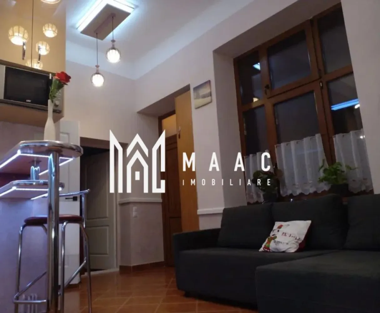 Apartament la casa I Decomandat I 70mp I Zona Centrala - MAAC Imobiliare va prezinta un apartament cu 3 camere, renovat in 2024, decomandat, in zona Centrala a Sibiului. Compartimentare: Living cu bucatarie open space, 2 dormitoare, 2 bai ( una cu vana ), dressing/ debara, terasa si pivnita. Loc de parcare in interiorul curtii pt o masina Ideal pentru o familie cu copii sau cuplu, situat intr-o zona usor accesibila si in apropierea tuturor punctelor de interes. Nu se accepta animale de companie. Imobilul este disponibil imediat. Pentru initializarea contractului se percepe o garantie in cuantumul unei chirii lunare. Pentru mai multe detalii sau vizionari mentionati ID: CP2429471 }}