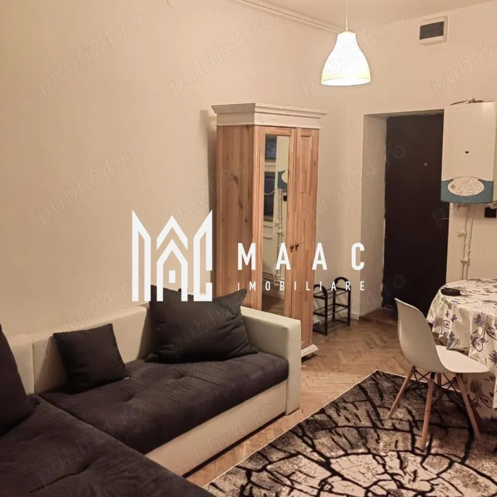 Apartament 3 camere | Etajul 1 | Ultracentrala - MAAC Imobiliare vă propune spre închiriere, pe termen lung, un apartament modern cu 3 camere, situat in zona ultracentrala, aproape de cele mai importante puncte de interes cultural și turistic.

Locuința are o suprafață utilă de 70 mp + boxă pentru depozitare și a fost recent renovată integral, beneficiind de instalații electrice și sanitare complet noi.

Apartamentul se află la etajul 1 al unei case P+1 și se închiriază complet mobilat și utilat, fiind pregătit pentru mutare imediată.

Compartimentare:
-2 dormitoare spațioase
-living open-space cu bucătărie
-baie
-boxă pentru depozitare

Imobilul este amplasat într-o curte comună.

Condiții de închiriere:
-Perioadă minimă: 1 an 
-Garanție: echivalentul unei luni de chirie
-Nu se acceptă animale de companie

Proprietatea este ideală pentru rezidență pe termen lung într-o zonă centrală.

Pentru mai multe detalii, vă rugăm să menționați telefonic că ați văzut anunțul cu CP3072379