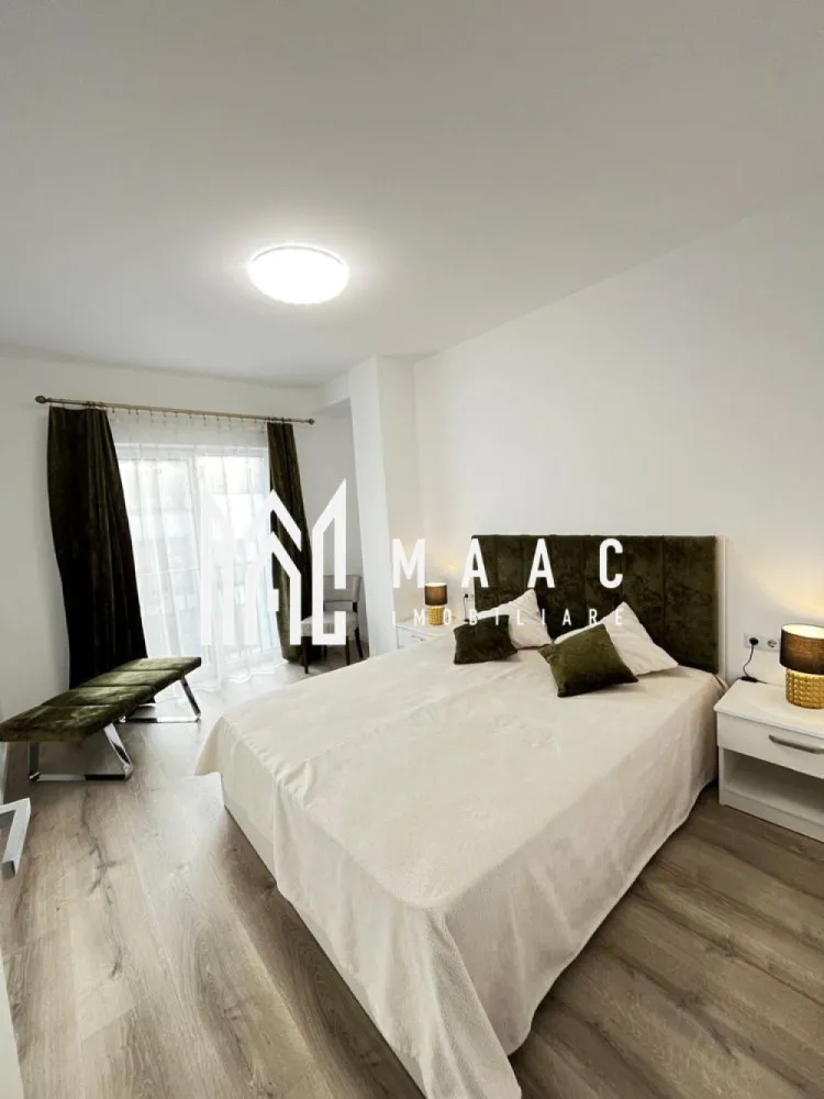 Apartament 2 camere | 54 MPU | Turnisor\Neppendorf - MAAC Imobiliare vă propune spre închiriere un apartament modern, luminos și bine compartimentat, situat într-un imobil nou din zona Neppendorf, Sibiu. Proprietatea este ideală pentru un cuplu sau o persoană activă, oferind confort, funcționalitate și acces facil atât către centrul orașului, cât și către autostradă.

Compartimentare:
living generos open space cu bucătărie
dormitor confortabil
baie spațioasă
hol de intrare
balcon cu acces din living

Dotări și avantaje:
apartament complet mobilat și utilat
mașină de spălat rufe
mașină de spălat vase
frigider
cuptor electric
plită electrică
televizor
Wi-Fi
încălzire în pardoseală
clasă energetică A
loc de parcare inclus
imobil dotat cu lift

Suprafață:
54 mp + balcon

Localizare:
Neppendorf, Sibiu – zonă liniștită, cu acces facil către principalele puncte de interes ale orașului

Condiții de închiriere:
preț: 490 €/lună
garanție: echivalentul unei chirii lunare
disponibilitate: 1 iunie

Pentru mai multe detalii sau pentru programarea unei vizionări, vă rugăm să ne contactați specificând: ID: CP3070129