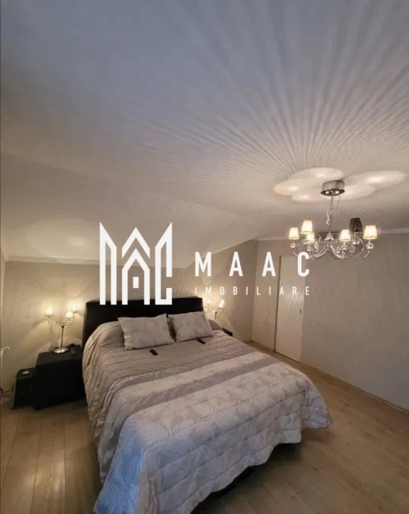 Casa cu 5 camere individuala | Curte | Zona Turnisor - MAAC IMOBILIARE vă propune spre închiriere o casă deosebită cu camere, modernă și complet utilată, situată într-o locație liniștită și sigură, în zona Turnișor din Sibiu. Această locuință reprezintă alegerea ideală pentru o familie care își dorește confort, spațiu și tehnologie de ultimă generație, într-o zonă rezidențială deosebită. Casă individuală SMART, construită în 2010 Regim de înălțime: Parter + Etaj Suprafață utilă: 250 mp Curte proprie de 300 mp, frumos amenajată, cu tuia și dale de beton Terasă acoperită, 2 balcoane și un garaj spațios Posibilitate de parcare în curte 5 grupuri sanitare Sistem inteligent integrat: controlul temperaturii, poarta electrică, garaj cu deschidere electrică, climatizare și senzori de inundație în băi și bucătărie, totul fiind accesibil de pe telefonul mobil Încălzire în pardoseală (la parter) Aer condiționat Sistem de supraveghere video și alarmă Tamplărie PVC de calitate, plase de insecte, gresie, faianță, parchet de lux Sistem fotovoltaic (10KW) pentru costuri de întreținere reduse Compartimentare: Parter: hol, birou cu baie proprie, bucătărie separată, zonă de dining, living generos cu ieșire pe terasa acoperită, grup sanitar Etaj: 3 dormitoare (unul cu baie proprie și dressing), un al doilea dressing, baie comună, acces la balcoane din dormitoare Demisol: zonă de relaxare, garaj și multiple spații de depozitare Pe lângă garaj, casa dispune de loc de parcare în curte, oferind astfel posibilitatea de a parca și în exterior. Această casă oferă o combinație perfectă între confortul cotidian și tehnologia de vârf, fiind ideală pentru o familie modernă ce își dorește un loc liniștit, dar accesibil. Zona este una deosebită, cu stradă privată și exclusivistă, fără aglomerația orașului. De ce să închiriezi această casă? Locație excelentă, într-o zonă rezidențială de prestigiu, cu acces rapid la punctele de interes ale orașului Întreaga locuință este mobilată și utilată modern, gata de mutat Costuri de întreținere scăzute datorită sistemului fotovoltaic și eficienței energetice Locuință sigură, cu sistem de supraveghere și alarmă, într-o zonă liniștită Parcare privată, curte frumos amenajată și multe spații de depozitare Mențiuni: Nu se acceptă animale de companie in interior. Nu se accepta fumatul in interior. Se percepe o garantie din cuantumul unei chirii luni. Termen de închiriere minim 1 an de zile. Locuința este disponibilă pentru închiriere din 1 Mai și oferă tot confortul și siguranța de care aveți nevoie. Contactați MAAC Imobiliare pentru mai multe detalii și pentru a programa o vizionare! Pentru mai multe detalii sau pentru a programa o vizionare, va rugam specificati telefonic: CP2378876 }}