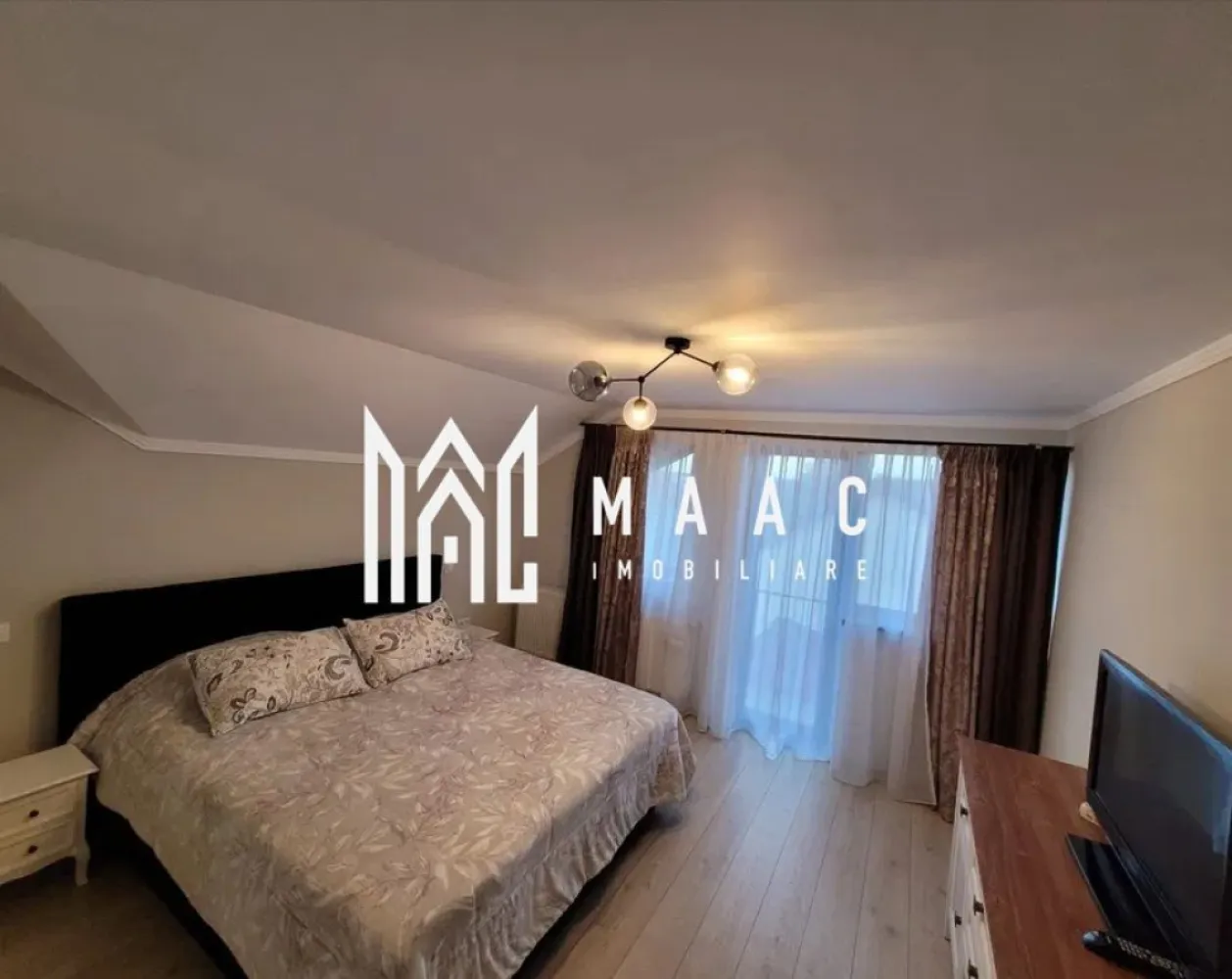 Casa cu 5 camere individuala | Curte | Zona Turnisor - MAAC IMOBILIARE vă propune spre închiriere o casă deosebită cu camere, modernă și complet utilată, situată într-o locație liniștită și sigură, în zona Turnișor din Sibiu. Această locuință reprezintă alegerea ideală pentru o familie care își dorește confort, spațiu și tehnologie de ultimă generație, într-o zonă rezidențială deosebită. Casă individuală SMART, construită în 2010 Regim de înălțime: Parter + Etaj Suprafață utilă: 250 mp Curte proprie de 300 mp, frumos amenajată, cu tuia și dale de beton Terasă acoperită, 2 balcoane și un garaj spațios Posibilitate de parcare în curte 5 grupuri sanitare Sistem inteligent integrat: controlul temperaturii, poarta electrică, garaj cu deschidere electrică, climatizare și senzori de inundație în băi și bucătărie, totul fiind accesibil de pe telefonul mobil Încălzire în pardoseală (la parter) Aer condiționat Sistem de supraveghere video și alarmă Tamplărie PVC de calitate, plase de insecte, gresie, faianță, parchet de lux Sistem fotovoltaic (10KW) pentru costuri de întreținere reduse Compartimentare: Parter: hol, birou cu baie proprie, bucătărie separată, zonă de dining, living generos cu ieșire pe terasa acoperită, grup sanitar Etaj: 3 dormitoare (unul cu baie proprie și dressing), un al doilea dressing, baie comună, acces la balcoane din dormitoare Demisol: zonă de relaxare, garaj și multiple spații de depozitare Pe lângă garaj, casa dispune de loc de parcare în curte, oferind astfel posibilitatea de a parca și în exterior. Această casă oferă o combinație perfectă între confortul cotidian și tehnologia de vârf, fiind ideală pentru o familie modernă ce își dorește un loc liniștit, dar accesibil. Zona este una deosebită, cu stradă privată și exclusivistă, fără aglomerația orașului. De ce să închiriezi această casă? Locație excelentă, într-o zonă rezidențială de prestigiu, cu acces rapid la punctele de interes ale orașului Întreaga locuință este mobilată și utilată modern, gata de mutat Costuri de întreținere scăzute datorită sistemului fotovoltaic și eficienței energetice Locuință sigură, cu sistem de supraveghere și alarmă, într-o zonă liniștită Parcare privată, curte frumos amenajată și multe spații de depozitare Mențiuni: Nu se acceptă animale de companie in interior. Nu se accepta fumatul in interior. Se percepe o garantie din cuantumul unei chirii luni. Termen de închiriere minim 1 an de zile. Locuința este disponibilă pentru închiriere din 1 Mai și oferă tot confortul și siguranța de care aveți nevoie. Contactați MAAC Imobiliare pentru mai multe detalii și pentru a programa o vizionare! Pentru mai multe detalii sau pentru a programa o vizionare, va rugam specificati telefonic: CP2378876 }}