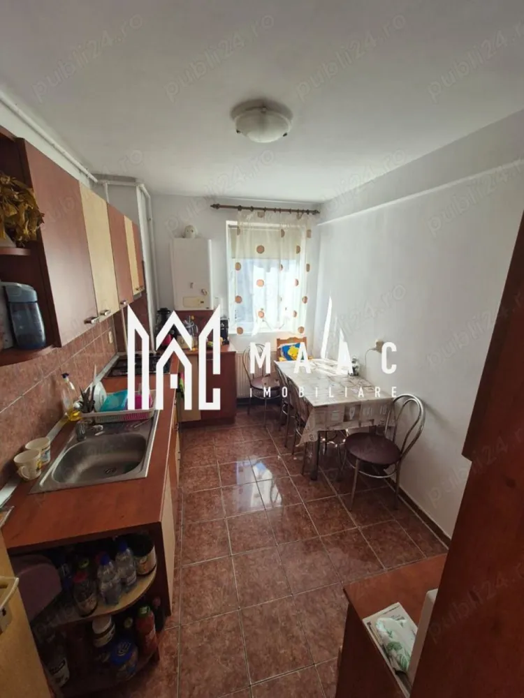 Apartament 4 camere | 84 MPU | Mihai Viteazul - MAAC Imobiliare vă propune spre vânzare Apartament 4 Camere, Mobilat și Utilat - 100 mp Utili! 🔑 Locație perfectă! MAAC Imobiliare vă propune spre vânzare un apartament spațios de 4 camere, ideal pentru o familie sau pentru cei care își doresc un cămin confortabil, bine compartimentat, într-o zonă liniștită și accesibilă. 🏠 Caracteristici: Suprafață utilă: 84 mp (totul intabulat pe acte) 3 dormitoare decomandate - fiecare oferind intimitate și spațiu generos. Living luminos - ideal pentru momentele de relaxare. Bucătărie mare și separată - complet dotată, perfectă pentru gătit cu drag. Baie cu aerisire naturală - confortul dumneavoastră este prioritatea noastră. Balcon - loc ideal pentru a te bucura de aerul curat. Pentru mai multe detalii și pentru programarea unei vizionări, vă rugăm să specificați ID-ul anunțului: CP2295439 }}