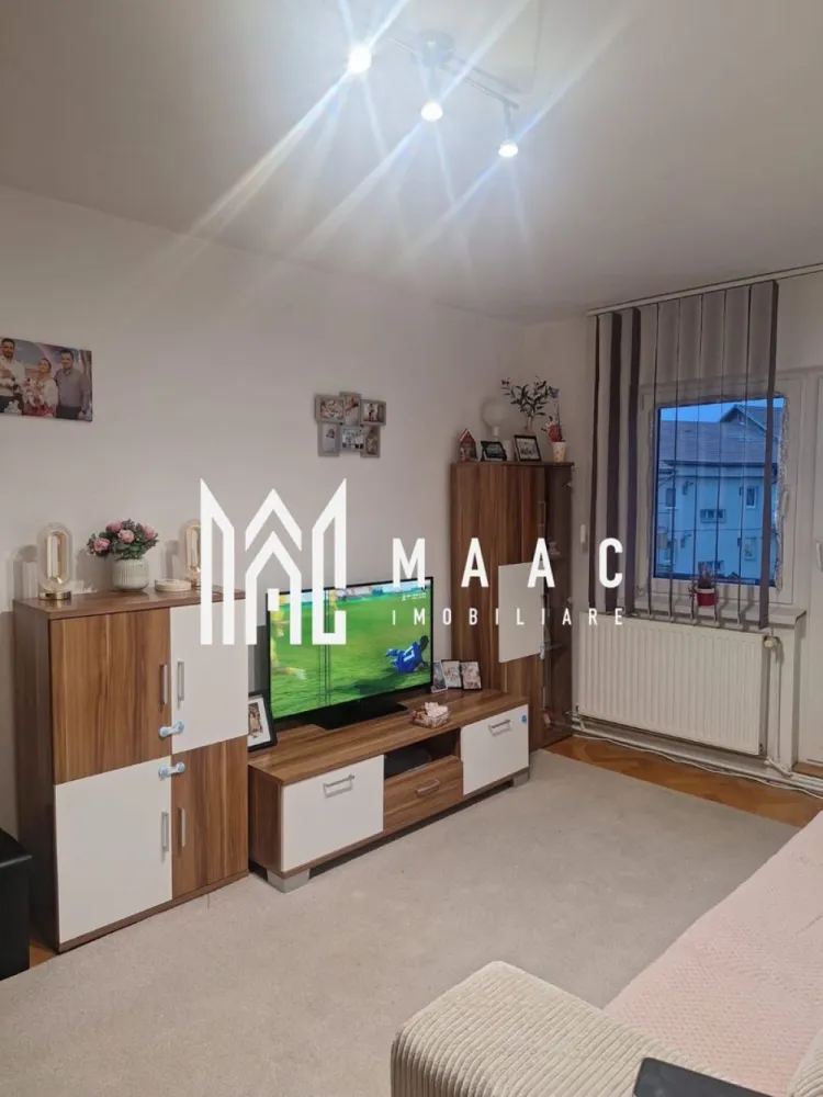 Apartament modern cu 3 camere decomandate | 75 mp | 2 balcoane - MAAC Imobiliare vă propune spre vânzare un apartament decomandat cu 3 camere, spațios și luminos, ideal pentru o familie sau pentru investiție, situat la etajul 4 al unui imobil bine poziționat.

Cu o suprafață de 75 mp, locuința impresionează prin compartimentarea practică, finisajele moderne și atmosfera primitoare oferită de lumina naturală din fiecare încăpere. Apartamentul dispune de 2 balcoane, perfecte pentru relaxare și pentru un plus de confort.

Compartimentare și avantaje:
3 camere decomandate
Suprafață utilă: 75 mp
Etaj 4
2 balcoane
Finisaje moderne
Camere luminoase și bine compartimentate

Localizare excelentă:
Apartamentul este amplasat într-o zonă foarte bine conectată, cu acces rapid către:
parcuri și zone verzi
centre comerciale și supermarketuri
cafenele și restaurante
Grădina Zoologică
stații de transport public aflate la doar câțiva pași

O proprietate ideală pentru cei care își doresc confort, accesibilitate și un stil de viață urban echilibrat.

Pentru detalii suplimentare, consultanță sau programarea unei vizionări, va rugăm să ne contactati specificand ID: CP3075801