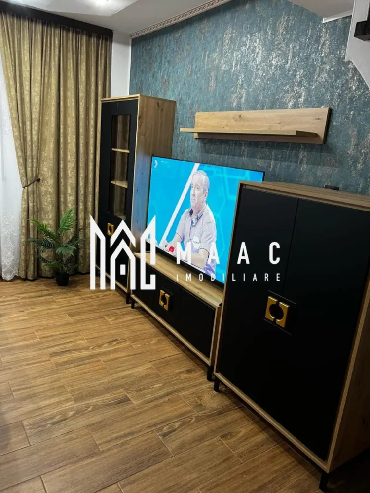 Apartament 3 Camere | 55 MPU | Renovat Recent | Hipodrom 2 - MAAC Imobiliare va prezinta un apartament complet renovat, situat în orașul Sibiu, cartierul Hipodrom 2. Apartamentul are o suprafață utilă de 54 mp și un balcon închis de 3,8 metri lungime. Este compus din două dormitoare decomandate, un living open space, o baie complet renovată și o bucătărie pe balcon. Specificații și dotări: Renovare completă: Gresie, faianță, sanitare, robineți noi. Centrala termică: Nouă, marca Ariston. Instalația electrică: Refăcută complet, inclusiv doze, prize, întrerupătoare etc. Balcon închis: Termopan complet, cu acoperiș nou. Ferestre: Schimbate, cu pervaz interior și exterior, uși interioare noi Pardoseală: Parchet în camere și gresie în living. Bucătărie pe balcon: Mobilier făcut pe comandă, electrocasnice noi (aragaz, hotă, frigider, mașină de spălat, uscător, espressor de cafea, televizor Smart). Apartamentul se vinde complet mobilat, cu toate electrocasnicele noi și garanțiile acestora. Facilități în apropiere: Grădiniță la 10 metri. Școală la 100 de metri. Supermarket PROFI la 100 de metri. Clinica Medicală la 200 de metri. Lidl, Dedeman, Mega Image, Piața. Stații de autobuz în apropiere. Pentru mai multe detalii precizati telefonic ca ati vazut anuntul cu ID : CP2285885 }}