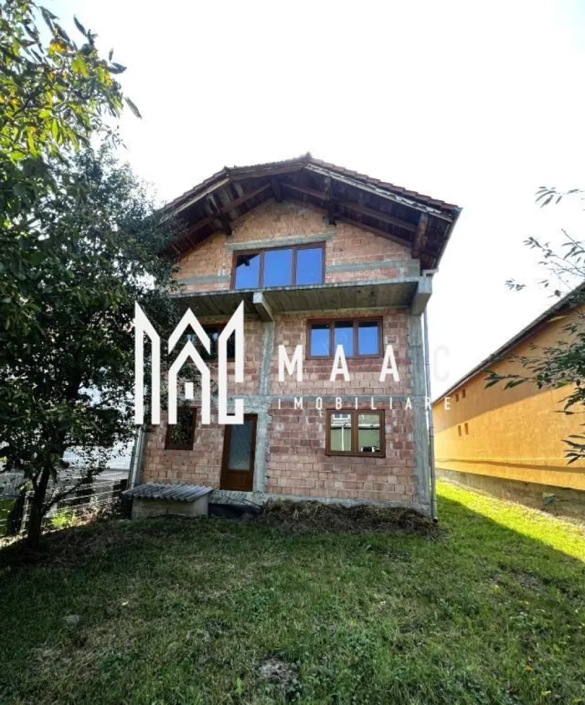 Casa Individuala de Vanzare I 5 Camere I Intabulata I Cisnadie - MAAC Imobiliare vă propune spre vânzare acest imobil pe 2 nivele- P+1E+M, situat intr-o zona linistita din Orasul Cisnadie. Compartimentare : Parter: - living 34.40 mp - hol 5.90 mp - bucatarie 17.50 mp - baie 5 mp -spalatorie 5.60 mp Etaj : - 2 dormitoare de 17.50 mp - 1 dormitor de 19.50 mp - baie 12.60 mp - hol 7.40 mp - balcon Etaj Mansarda 76.50 mp, 2 balcoane de 9.60 mp Casa beneficiaza si de 2 pivnite cu suprafata de 16.94 mp/ 12.13 mp, despartite de un hol de 7.80 mp. Predarea se face la stadiul prezentat in poze ( la rosu ), ceea ce prezinta un avantaj pentru a va putea modela locuinta de vis dupa bunul plac. Proprietatea este intabulata si situata intr-o zona linistita, in imediata apropiere a orasului Sibiu. Pentru mai multe detalii precizati telefonic ca ati vazut anuntul cu ID: CP2259791 }}