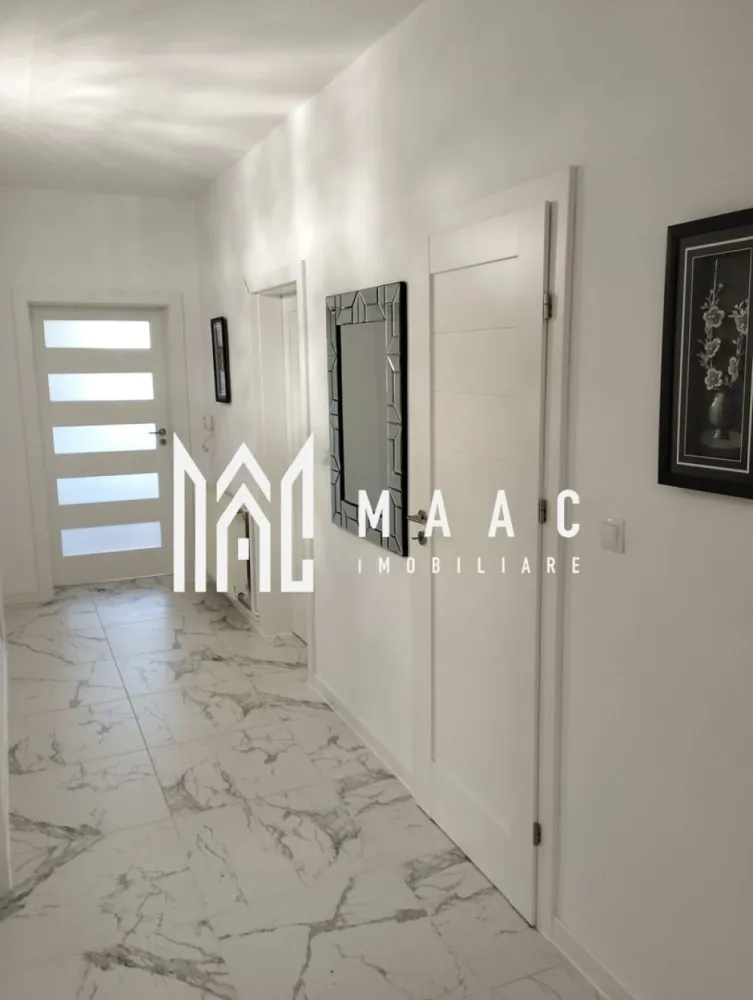 Casa individuala, 4 camere I Teren 631 mp I Garaj I Lazaret - MAAC Imobiliare propune spre vanzare o proprietate, cu 4 camere, situata in Lazaret, in zona linistita, de case. Cu regim de inaltime D+P+M si 631 mp teren, casa, orientata pe S-E, luminoasa in cea mai mare parte a zilei, este imprejmuita cu gard metalic, are poarta culisanta, pe role, zona pavata pentru acces auto si acces pietonal. Parterul (cu elevatie 1,5 m înălțime) este complet decomandat si cuprinde: hol generos, renovat si decorat modern, bucatarie inchisa, camara, living, doua dormitoare, birou, baie de serviciu cu dus, baie mare cu vana si geam de aerisire. Livingul are acces in terasa ce da spre curtea din spate. Mansarda este neamenajata, open space, dar cu posibilitatea de a configura acolo 2-3 camere si o baie. La demisol este pivnita, uscata, aerisita-2 incaperi. In fata casei, pe o zona de cca 6 m latime, e amenajata o gradina cu flori, ce ofera bucurie privitorilor si un plus de intimitate casei. Spatele casei ofera posibilitatea de a parca doua masini, curte pavata pe o portiune care include un garaj dar si un spatiu pentru barbeque. In planul 2 gasim o parcela de gradinuta cu legume. Casa are termo-hidro-izolatie, incalzirea se face cu centrala termica noua (in garantie!) si calorifere, acoperisul-tigla de beton. Circuit antiefracție; sistem de protecție la supratensiuni -montat la tabloul electric principal. Sistem iluminare nocturna, cu senzor mișcare (energie solara), cișmea dubla si canalizare. Intregul spatiu al proprietatii este eficientizat si raspunde atat nevoilor organizatorice casnice cat si celor care tin de relaxare si de petrecere a timpului in mod placut. Se vinde mobilata/utilata. Zona este linistita, doar de case, usor retrasa de la zgomotul strazilor principale. Pentru mai multe detalii precizati telefonic ca ati vazut anuntul cu ID:CP2251778 }}