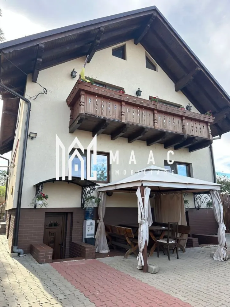 Casa 6 camere I P+E I Curte I 200MPU I Selimbar - MAAC imobiliare va prezinta o casa situata in Selimbar ce are regim de inaltime P+E.

Ideală atât pentru familii, cât și pentru cei care doresc să împartă locuința în două unități independente, Intrarea separată pentru etaj oferă flexibilitate și funcționalitate.

La Parter-3 camere luminoase, baie modernă, bucătărie spațioasă.

Etaj (acces separat din exterior): 2 camere generoase, living confortabil, baie elegantă, dressing.

Podul este mansardabil. La subsol-pivnita.

Se vinde mobilat/utilat.

Pentru mai multe informații sau pentru a programa o vizionare, nu ezitați să ne contactați, specificand ID:CP2297343