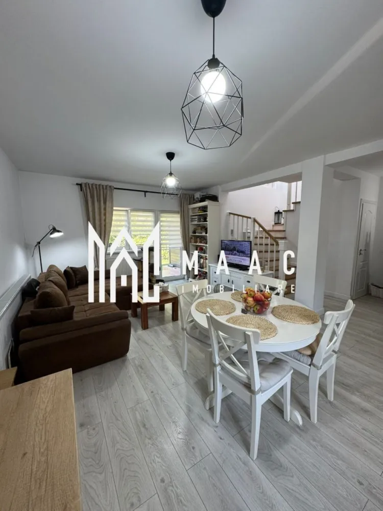 Casa individuala | Teren | Zona Sura Mare - MAAC Imobiliare propune spre vanzare o casa de tip duplex situata intr-un cartier rezidential in Sura Mare.. Suprafata totala teren: 265 mp, teren liber 215 mp. Regimul de inaltime al casei este P+M, avand urmatoarea compartimentare: La parter regasim bucataria de tip open space, baie de serviciu complet mobilata si utilata,spatiu de depozitare inchis de tip dressing si living spatios cu acces spre curtea interioara a casei. La etaj gasim doua dormitoare matrimoniale spatioase, dotate cu balcon individual, precum si o baie complet mobilata si utilata. Ambele bai au geam de aerisire, iar una are in dotare cabina de dus si cealtalta are cada. Casa dispune de o gradina spatioasa de 215mp, caropt masina precum si spatiu de depozitare extern. Pentru mai multe detalii precizati telefonic ca ati vazut anuntul cu ID : CP2137299 }}