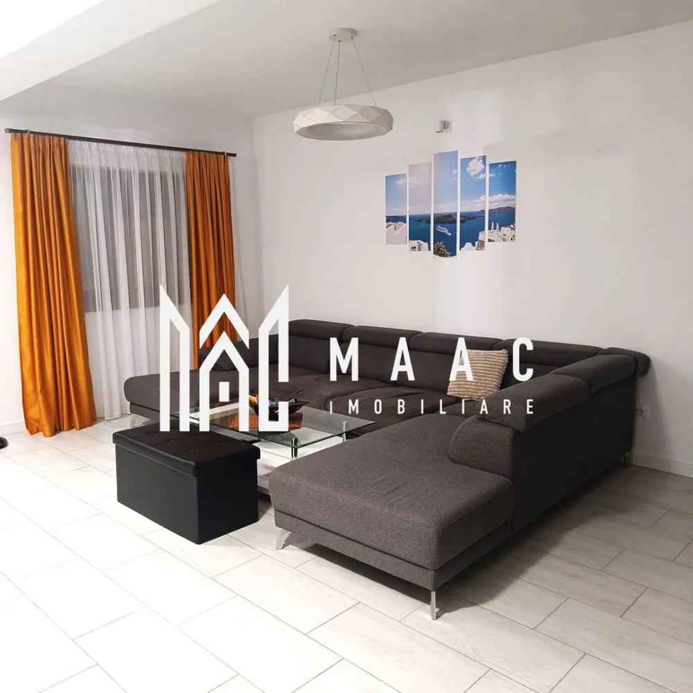 Casa 4 camere | Curte proprie | Panouri solare | Sura Mica - MAAC Imobiliare propune spre vanzare un duplex situat in Sura Mica. Suprafata totala teren: 200mp Suprafata utila: 115 mp (57,5 mp per nivel) Constructie 2021 Parter tip open space: living generos cu semineu, spatiu de servit masa (dining), bucatarie cu insula, complet utilata, camara, baie cu cabina de dus si geam de aerisire. Etaj: 2 dormitoare cu balcon fiecare, 1 dormitor utilat ca si office space, baie cu geam de aerisire si cada, debara. Exterior: terasa exterioara mobilata la parter, spatiu de parcare pentru 2 masini, gratar generos din fier cu spatiu de lucru, jacuzzi, pivnita. Casa este racordata la toate utilitatile, se vinde complet mobilata si utilata ( electrocasnice: aragaz, aspirator, cafetiera, cuptor cu microunde, fier de calcat, frigider, hota, masina de spalat rufe, masina de spalat vase, robot bucatarie, sandwich-maker, toaster, TV). Panouri solare 3 Kw montate 2024. Pentru mai multe detalii precizati telefonic ca ati vazut anuntul cu ID: CP2103454 }}