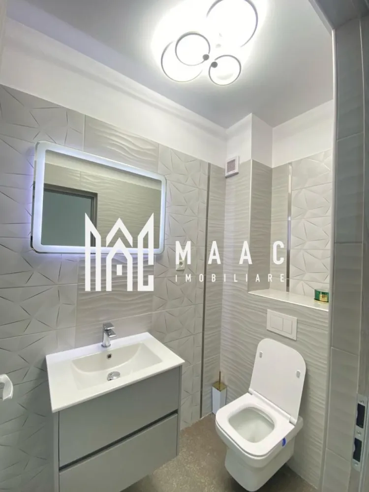 Penthouse | 3 camere | Terasa 110 mp | Jacuzzi - MAAC Imobiliare va propune spre vanzare un penthouse modern cu 3 camere, are o suprafata utila de 100 mp. situat la etajul 4/4, in zona Sura Mica. Se vinde complet mobilat si utilat cu : masina de spalat haine, masina de spalat vase, plita electrica, cuptor electic, cuptor cu microunde, frigider, TV. Compartimentare: living spatios si luminos cu iesire in terasa, bucataria separata si mobilata, 2 dormitoare, 2 bai cu geam de aerisire ( una are dus, iar cealalta are cada) si o terasa generoasa. Terasa cu super priveliste atat spre muntii Fagaras, cat si spre Paltinis, are zona de jacuzzi si are bucatarie exterioara cu gratar, minibar, coltar si loc de luat masa. In terasa accesul se face prin living si dormitor. Pentru mai multe detalii precizati telefonic ca ati vazut anuntul cu ID: CP2087025 }}