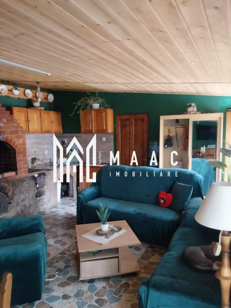 Casa 4 camere I Sărata I 3800 MP - Maac Imobiliare vă propune spre vânzare o casă în localitatea Sărata, aflată la jumatate de ora de Sibiu. Este alcătuită din: hol, 3 dormitoare, 2 bucătări, 2 băi, pod, curte și grădină împrejmuită. Curtea (800 mp), cu acces auto, spațiu de barbeque, în plan secundar șura și gradină (2900). Situată în zona centrală a localității, oferind acces rapid către măgazine, în apropierea râului cu priveliște superbă asupra muntelui. Pentru mai multe detalii precizați telefonic ca ați văzut anunțul cu ID: CP2078273 }}