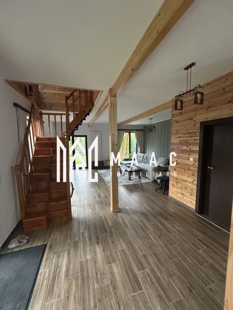 Casă de vacanță I Valea Avrigului I Casă Verde - MAAC Imobiliare va propune spre vânzare o casă situată pe Valea Avrigului. - Zonă de interes turistic, cu multe atracții și proiecte viitoare. Tip construcție: Casa verde, structură din lemn, izolată cu 20 cm izolație interioară și polistiren ESP 100 de 100 mm exterior. Parter: 98 mp - living cu bucătărie open space de 80 mp, baie complet utilată si acces la terasă. Etajul cuprinde 4 dormitoare mobilate cu lemn masiv, hol, baie finalizată, terasă superioară cu vedere la munții Făgăraș și râul Avrig. Curtea de 500 mp unde gasim: zona barbecue, leagăn rustic, pomi fructiferi, tuia. Utilități: Gaz, apă, curent, canalizare prin microstație de epurare vidanjabilă Încălzire: Centrală termică pe gaz Ariston Alteas One+Net 30 Kw, programabila de la distanta prin aplicație, calorifere din aluminiu verticale de 2m, posibilitate montare panouri solare. Stare: Mobilată și utilată Aceasta casa este ideală pentru locuit permanent sau ca investiție turistică datorită poziționării și dotărilor de calitate. Pentru mai multe detalii astept telefonul dumneavoastra cu specificatia ca ati vazut anuntul CP2039235 }}