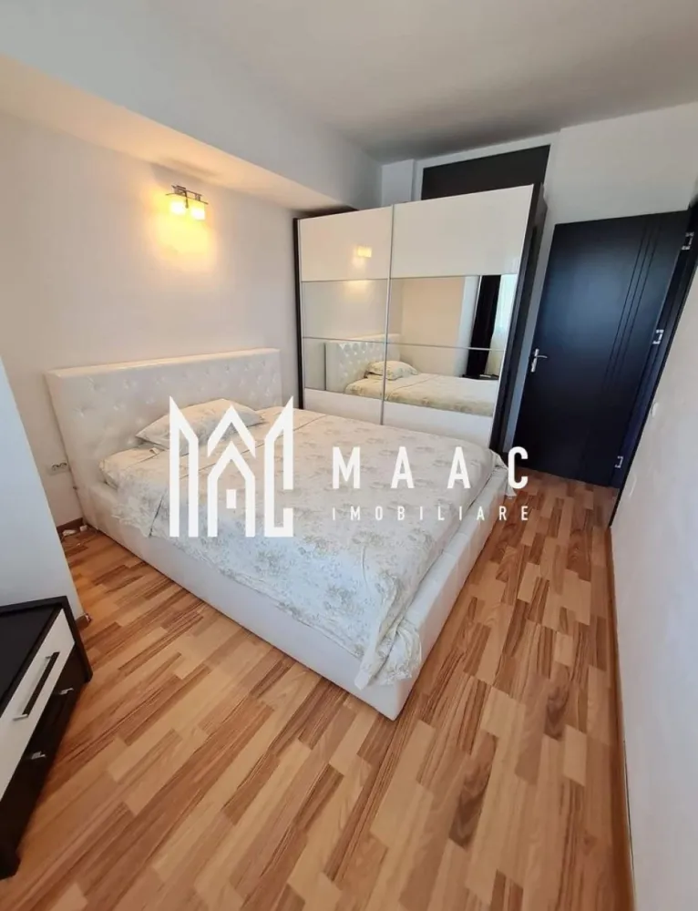 Apartament 3 camere | 70 MPU | - MAAC Imobiliare vă propune spre vânzare un apartament cu 3 camere, spațios și modern, ideal pentru o familie cu copii sau pentru investiție în vederea închirierii. Proprietatea este situată la etajul 4 al unui imobil prevăzut cu 2 lifturi și se remarcă prin suprafața generoasă de 70,08 mp, compartimentarea eficientă și confortul oferit de amenajarea completă. Apartamentul se vinde complet mobilat și utilat, fiind pregătit pentru mutare imediată, fără investiții suplimentare.

Locuința beneficiază de un living open-space generos de 31,45 mp, cu bucătărie integrată, două dormitoare confortabile și o baie spațioasă, oferind un spațiu optimizat pentru confortul zilnic. Balconul închis de 11,57 mp poate fi utilizat atât ca zonă de relaxare, cât și ca spațiu suplimentar de depozitare. În plus, apartamentul dispune de debara practică și hol de acces bine organizat, contribuind la o compartimentare funcțională și luminoasă.

Caracteristici:

Apartament cu 3 camere
Suprafață totală de 70,08 mp
Etaj 4
Bloc prevăzut cu 2 lifturi
Compartimentare practică și luminoasă
Se vinde mobilat și utilat la cheie
Ideal pentru locuit sau investiție

Compartimentare:
-Living open-space generos de 31,45 mp
-Două dormitoare confortabile
-Bucătărie integrată în zona de living
-Baie spațioasă
-Balcon închis de 11,57 mp
-Debara pentru extra spațiu de depozitare
-Hol de acces bine organizat

Dotări:
-Mobilier complet
-Electrocasnice incluse
-Finisaje moderne
-Balcon închis
-Spații generoase și bine iluminate natural
-Debara practică pentru depozitare suplimentară
-Imobil dotat cu două lifturi

Avantaje:
-Ideal pentru familii datorită suprafeței și compartimentării
-Potrivit pentru investiție și închiriere imediată
-Mutare fără investiții suplimentare
-Acces facil și confort sporit oferit de cele 2 lifturi
-Spațiu generos și bine optimizat
-Locuință pregătită complet pentru noii proprietari

Pentru mai multe detalii și stabilirea unei vizionări, vă rugăm să menționați la telefon numărul CP3079050.